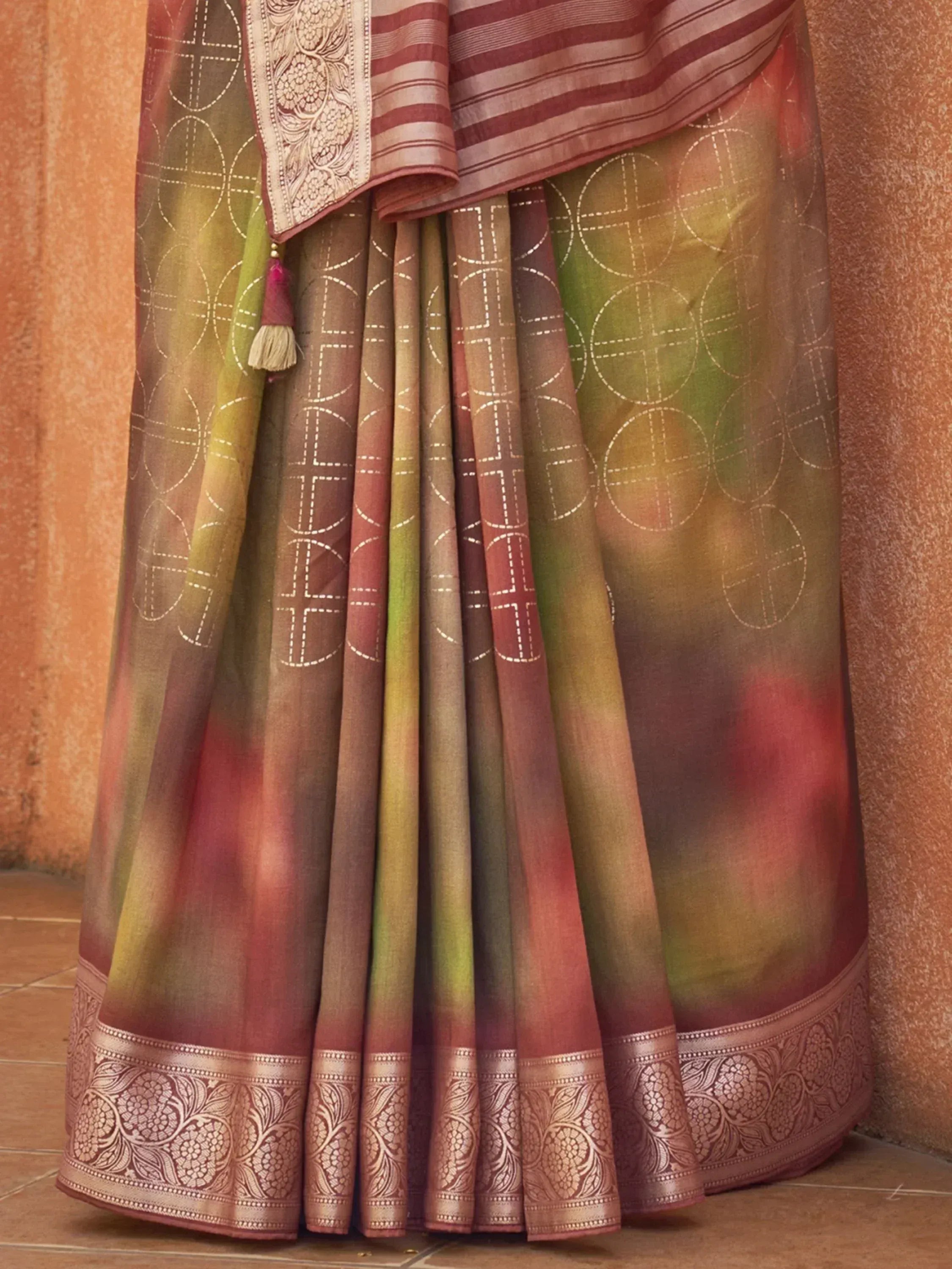 Elegant Indian saree with ombre green-red hues, geometric print, and embroidered border for ethnic wear
