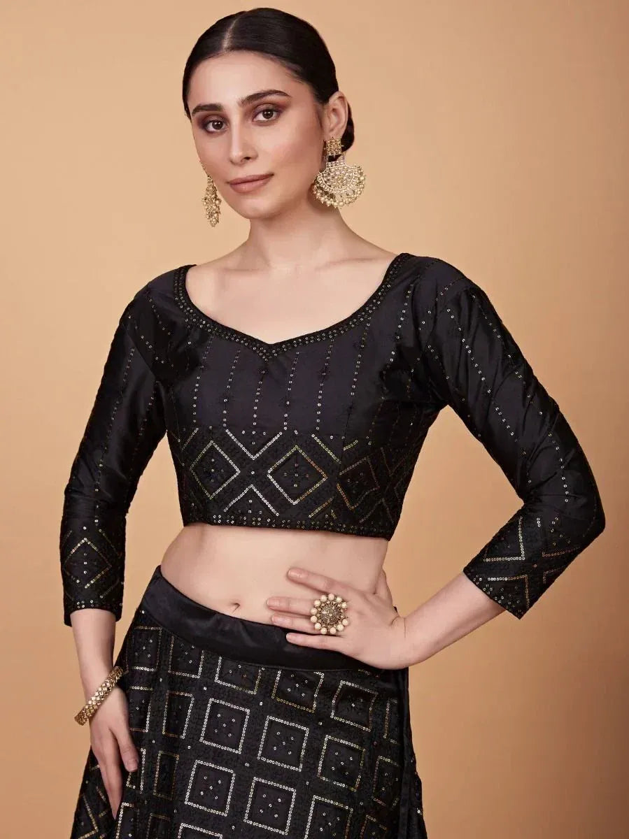 Black embroidered lehenga choli with geometric mirror work, perfect for Indian ethnic wear occasions
