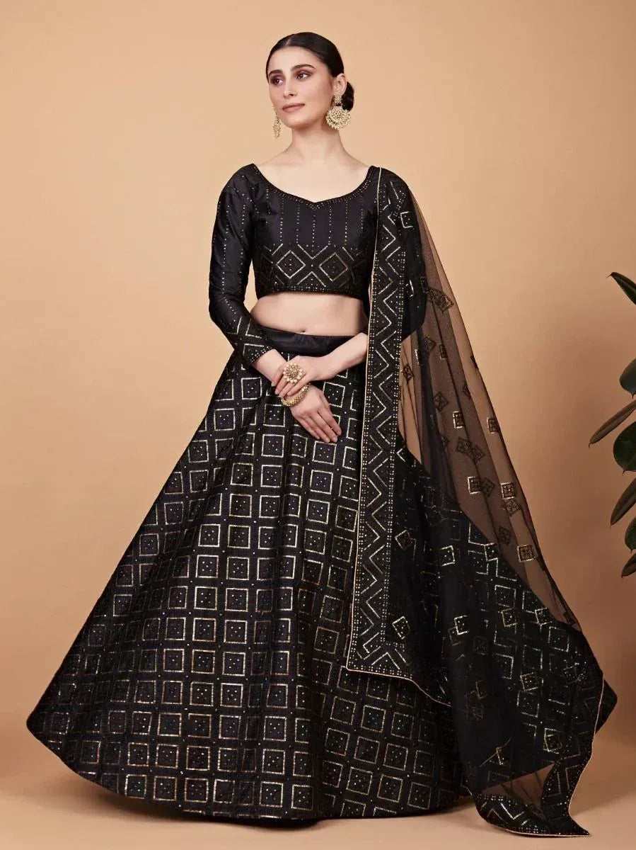 Black embroidered lehenga choli with geometric print and sheer dupatta, ethnic Indian wear
