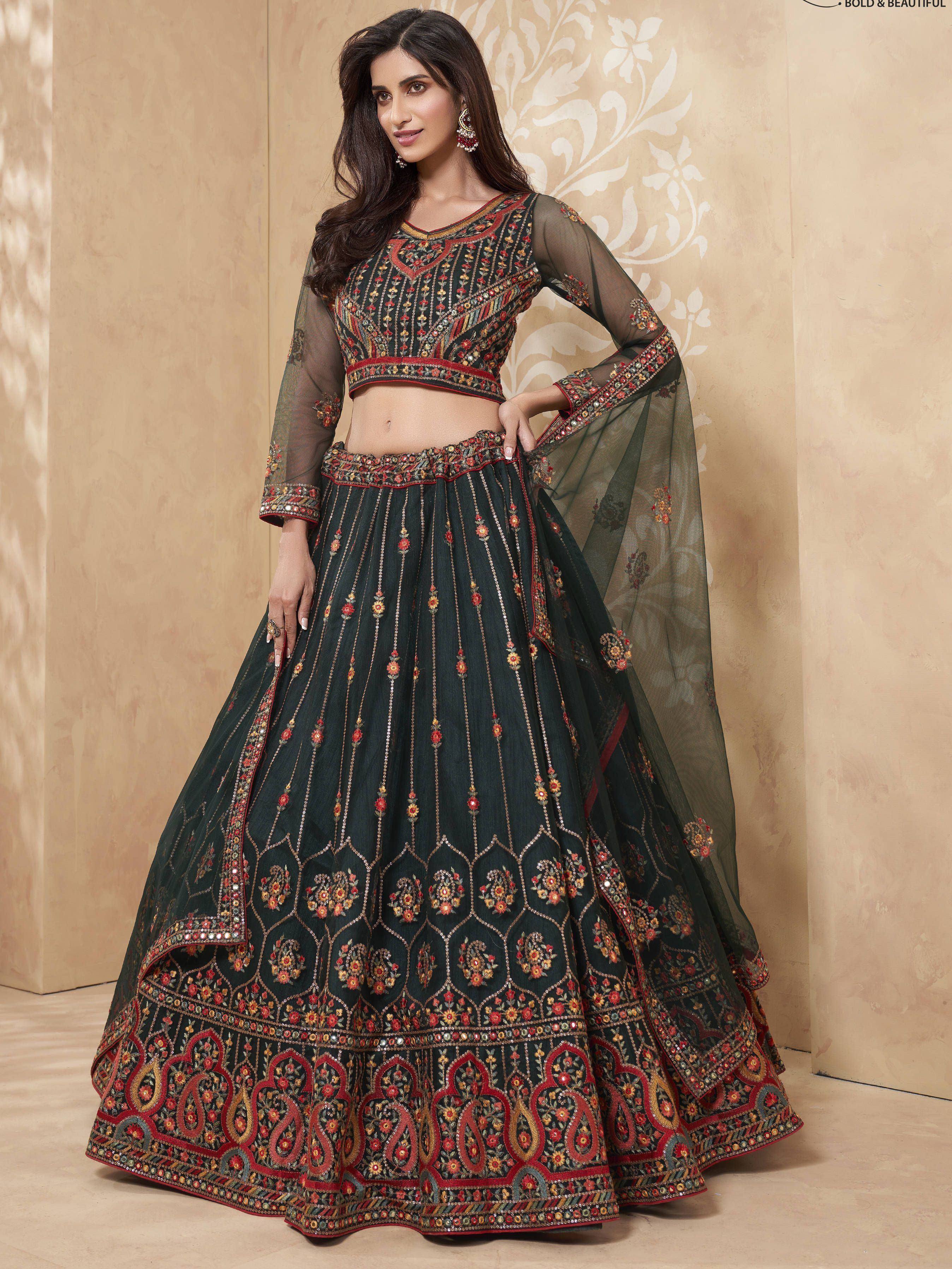 Dark green embroidered lehenga choli with sheer sleeves, perfect for Indian weddings and festive occasions.