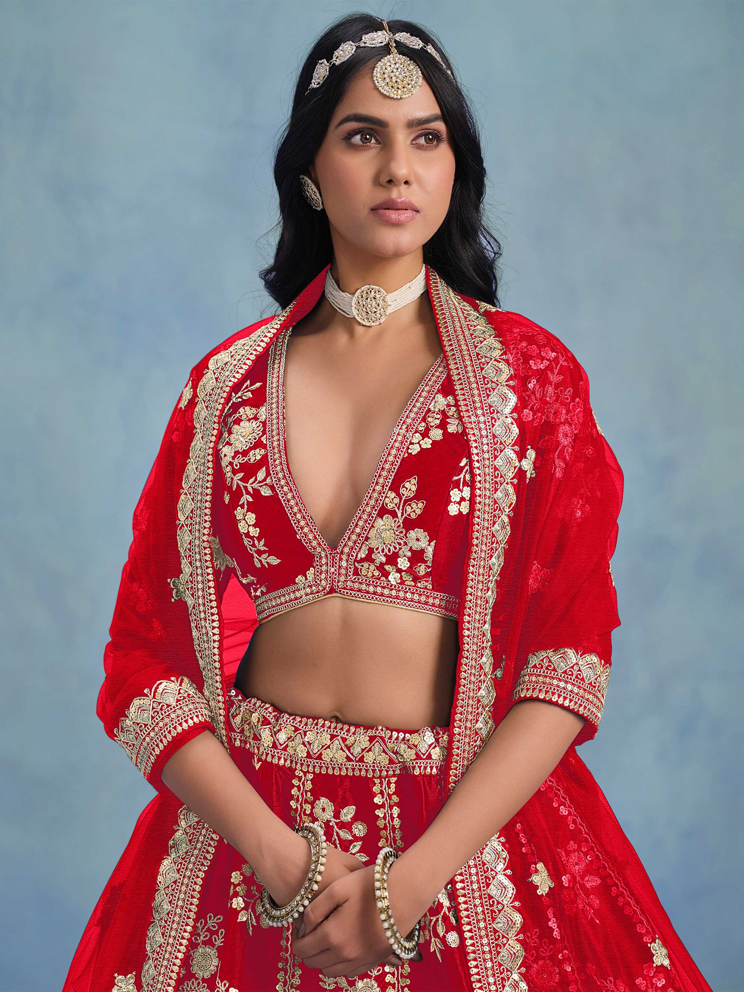 Incredible Red Embroidered Silk Wedding Wear Lehenga Choli