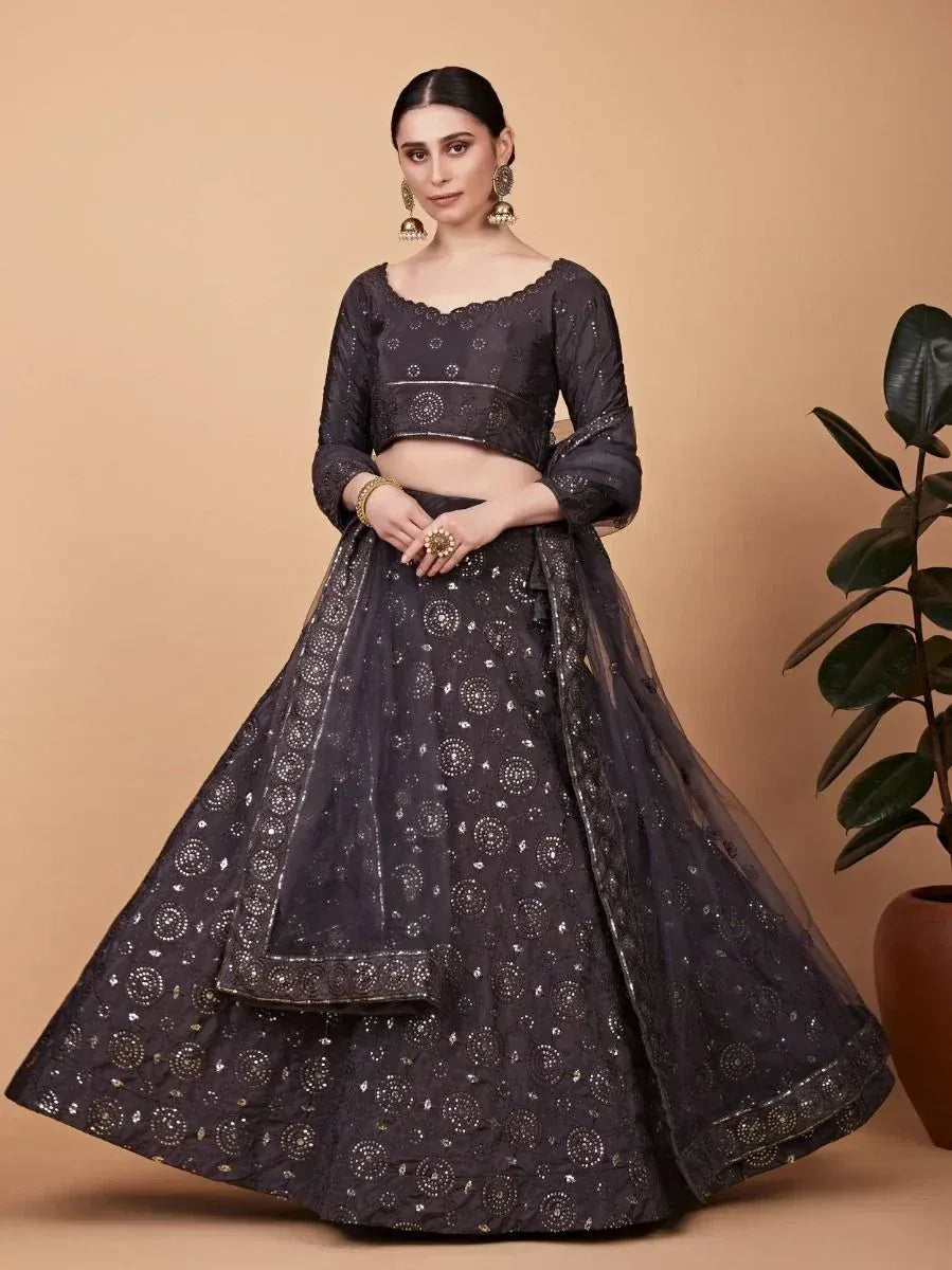 Black embroidered lehenga choli with scalloped blouse, perfect for Indian ethnic wear occasions