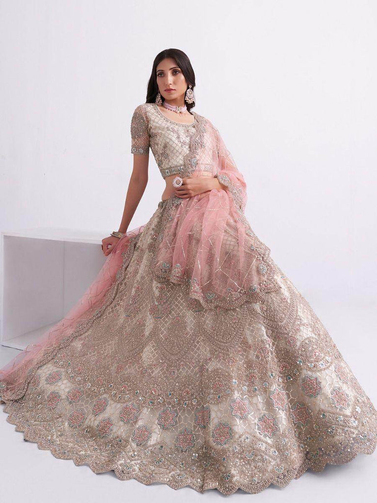 Lustrious Off-white Cording Work Net Bridal Lehenga Choli