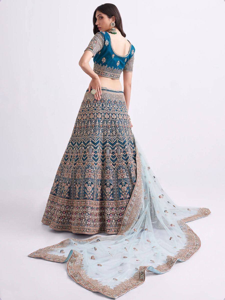 Teal embroidered lehenga choli with gold detailing and sheer dupatta, Indian ethnic wear