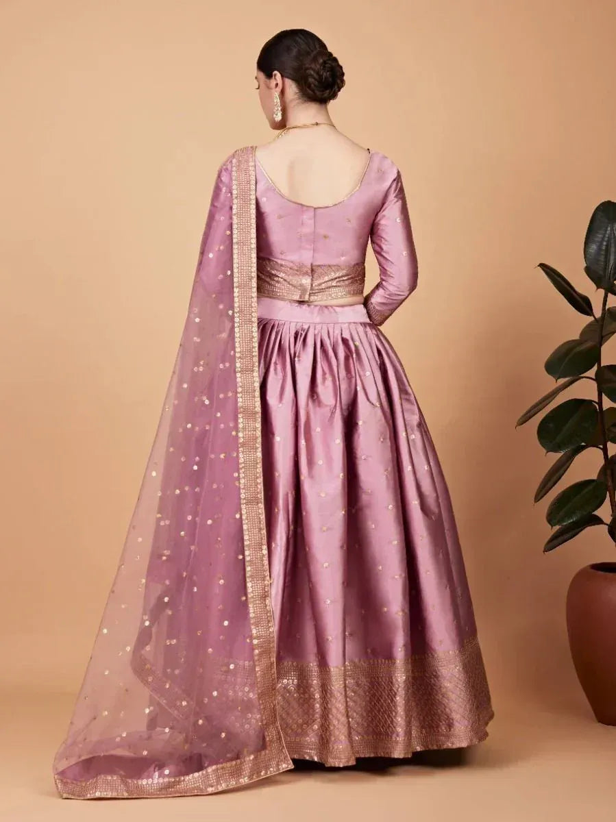 Lavender designer lehenga choli with gold embroidery and sheer dupatta, back view