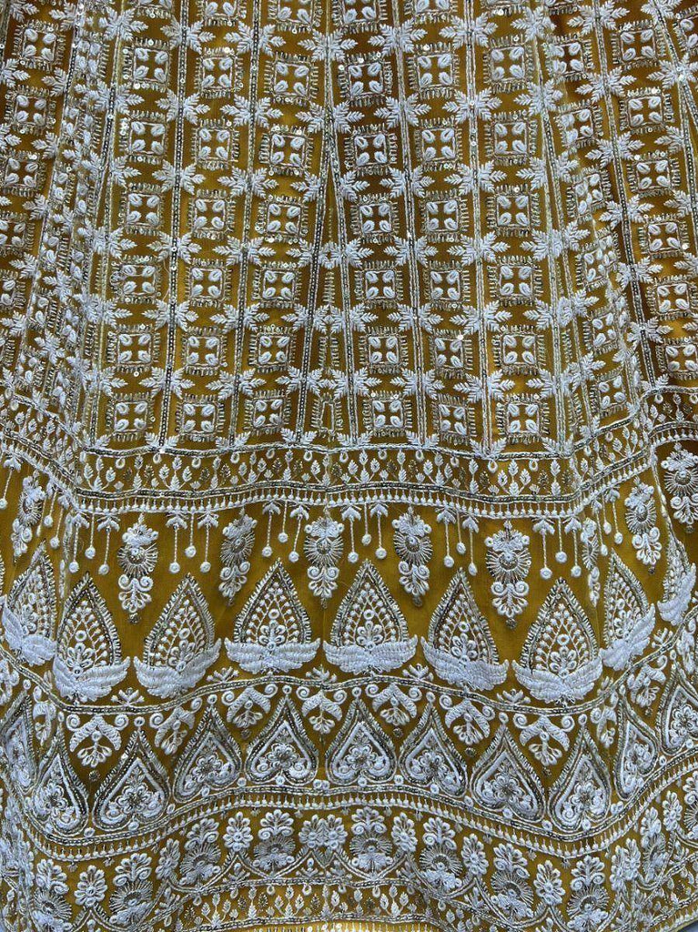 Stunning Yellow Thread Embroidered Net Lehenga Choli