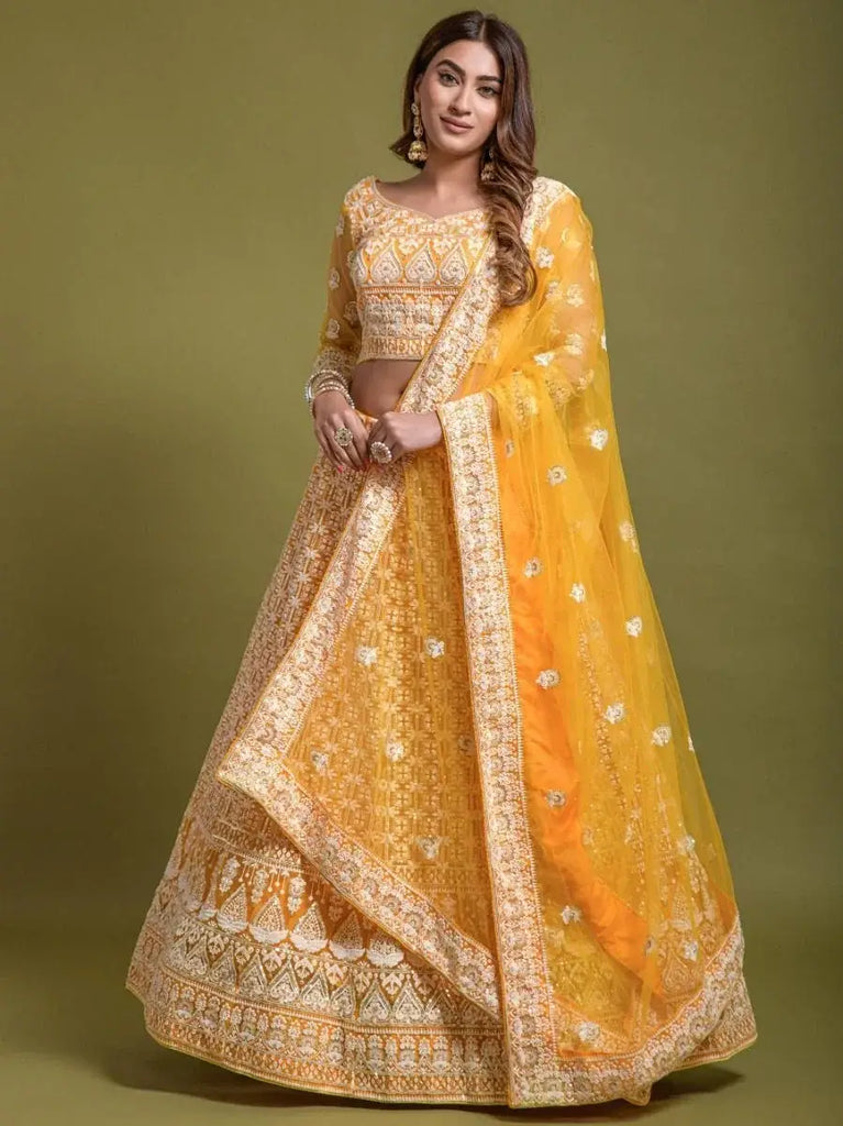 Stunning Yellow Thread Embroidered Net Lehenga Choli