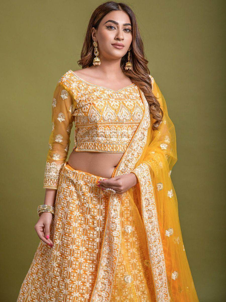 Stunning Yellow Thread Embroidered Net Lehenga Choli