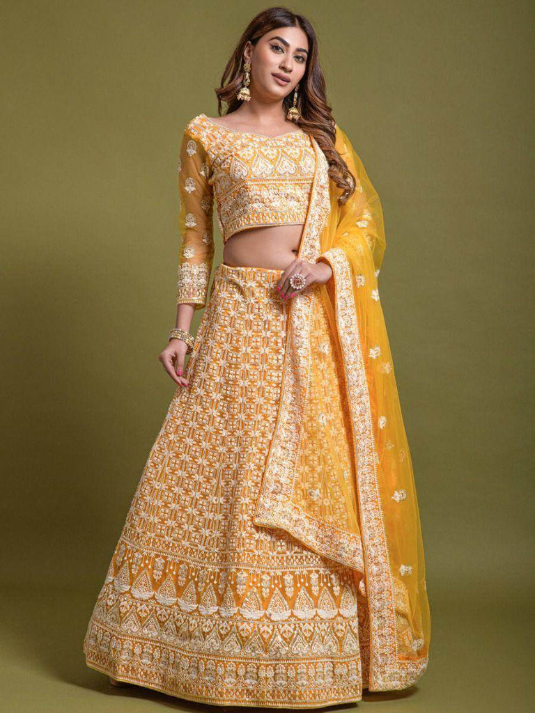 Stunning Yellow Thread Embroidered Net Lehenga Choli