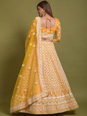 Stunning Yellow Thread Embroidered Net Lehenga Choli