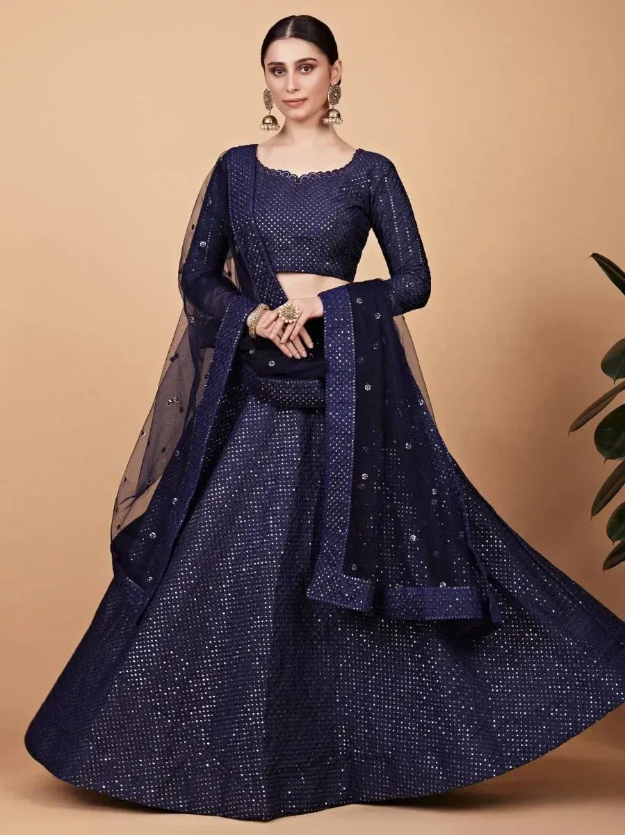 Navy blue designer lehenga choli with sequin work and sheer dupatta, perfect for Indian ethnic occasions