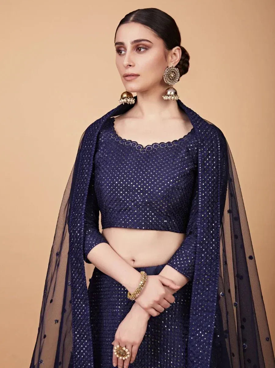 Navy blue sequin lehenga choli with sheer dupatta, perfect for Indian ethnic wear occasions