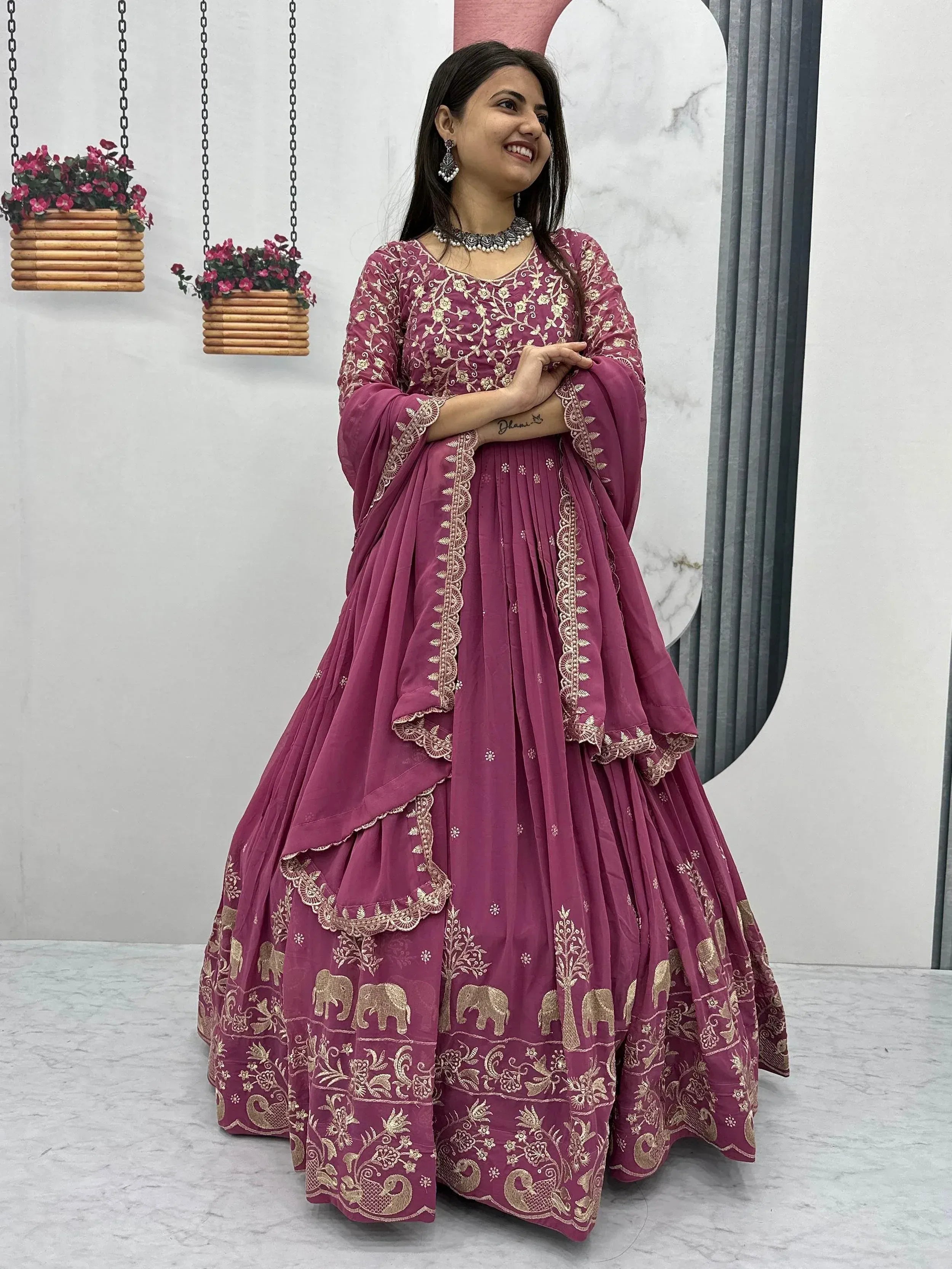 Purple Indian ethnic lehenga choli with gold elephant and floral embroidery, perfect for weddings and festivals.