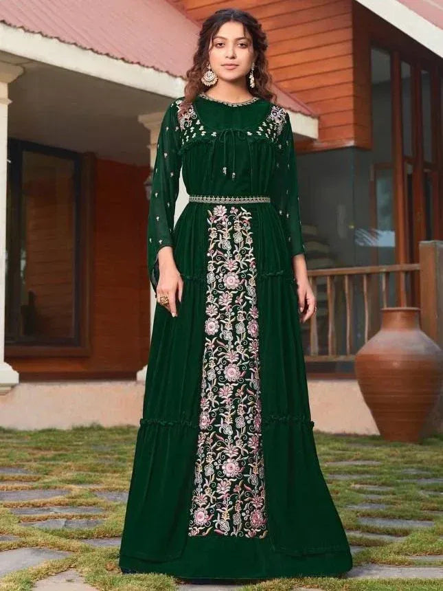 Emerald green embroidered ethnic gown with floral detailing, perfect for Indian occasions