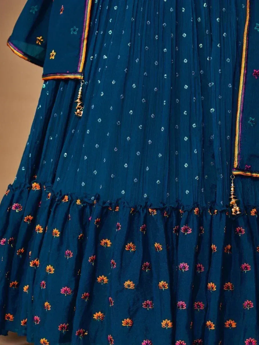 Blue floral embroidered ethnic gown with pleated skirt and tassel detailing