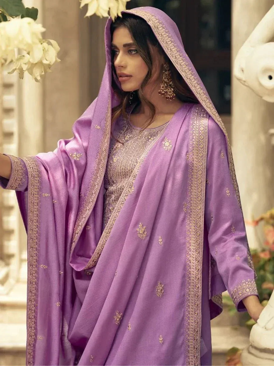 Lavender ethnic salwar kameez with gold embroidery and dupatta, perfect for Indian festive occasions
