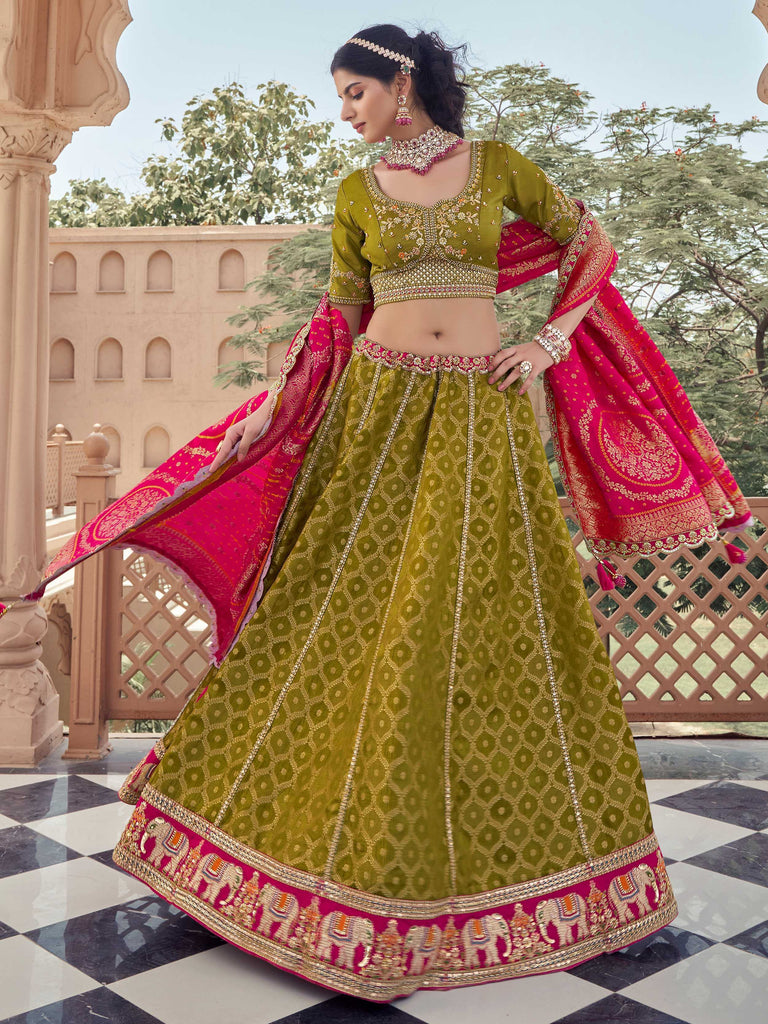 Pretty Green Embroidered Tissue Wedding Wear Lehenga Choli
