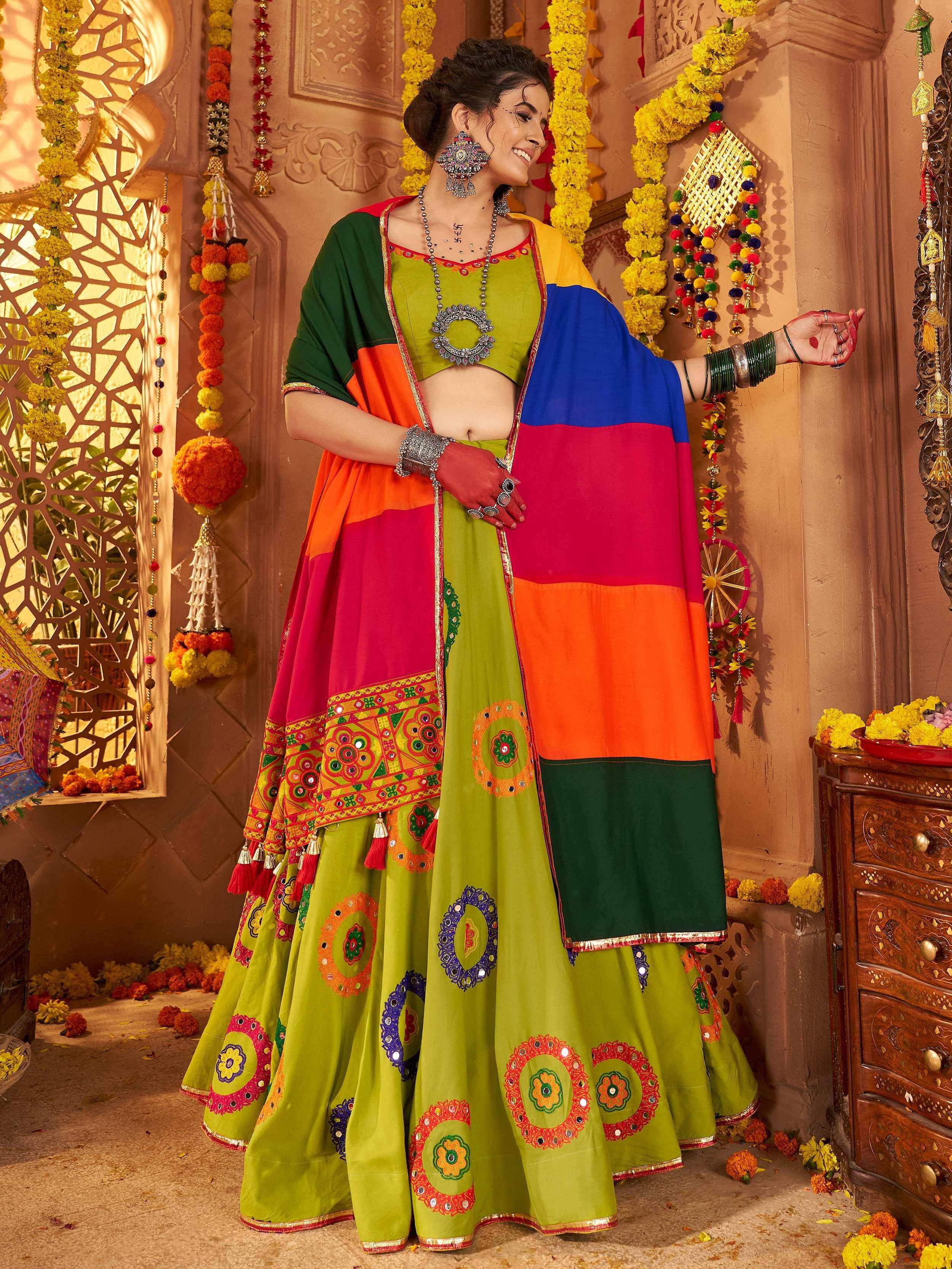 Vibrant green lehenga choli with colorful block print dupatta, perfect for Indian festivals and celebrations.