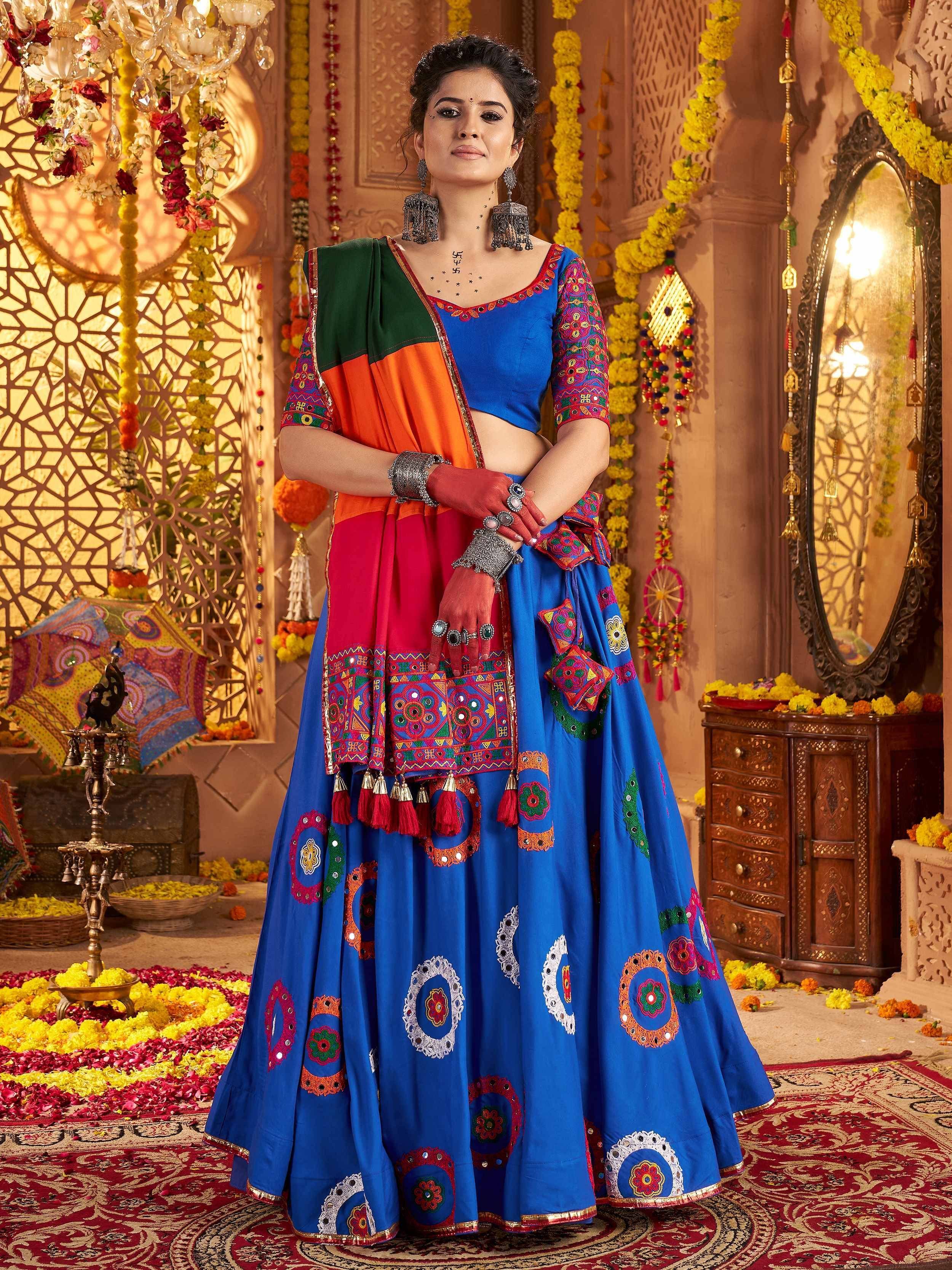 Vibrant blue embroidered lehenga choli with colorful dupatta, perfect for Indian ethnic occasions and festive wear.