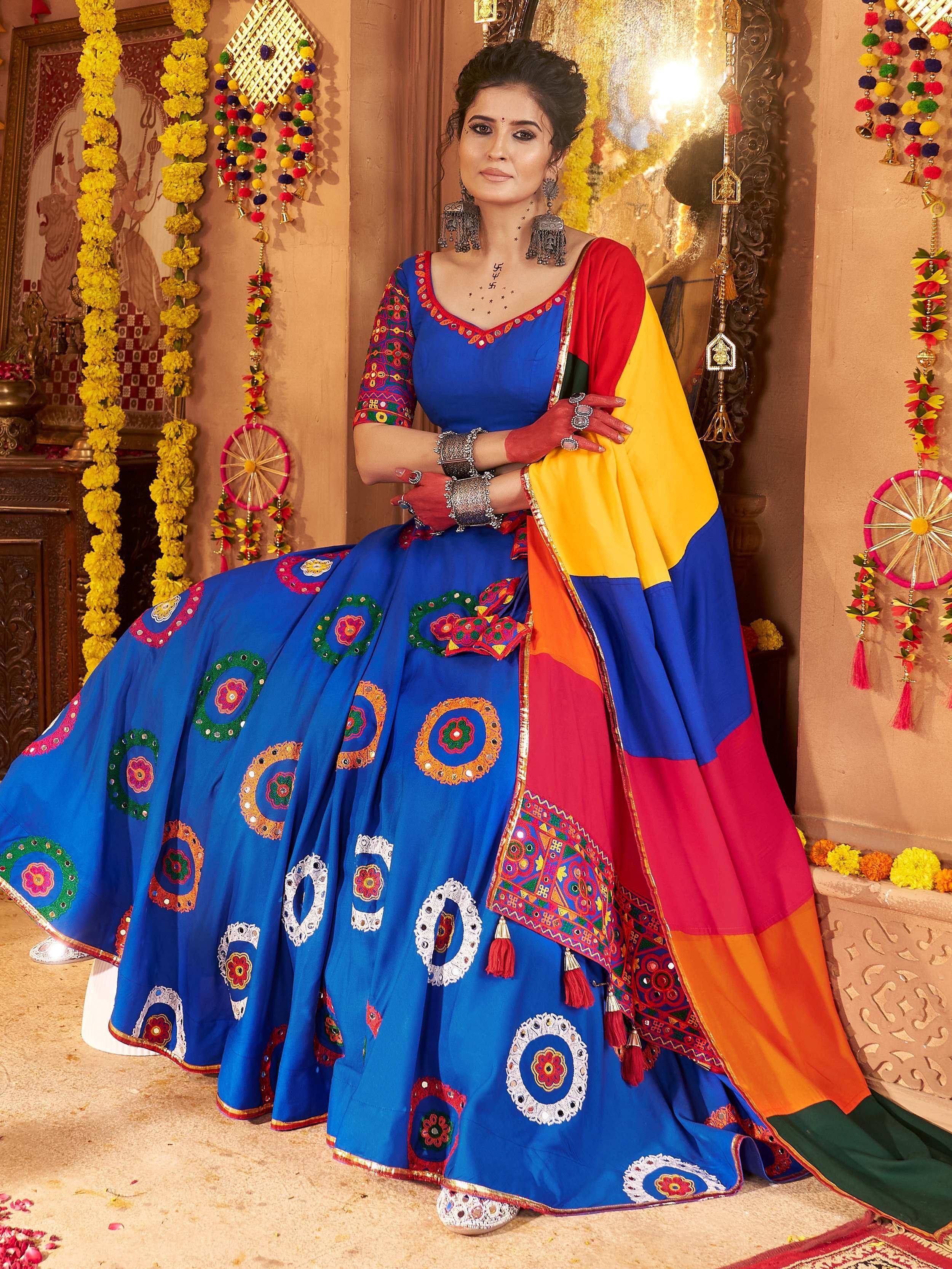 Blue embroidered lehenga choli with colorful dupatta, traditional Indian ethnic wear for festive occasions