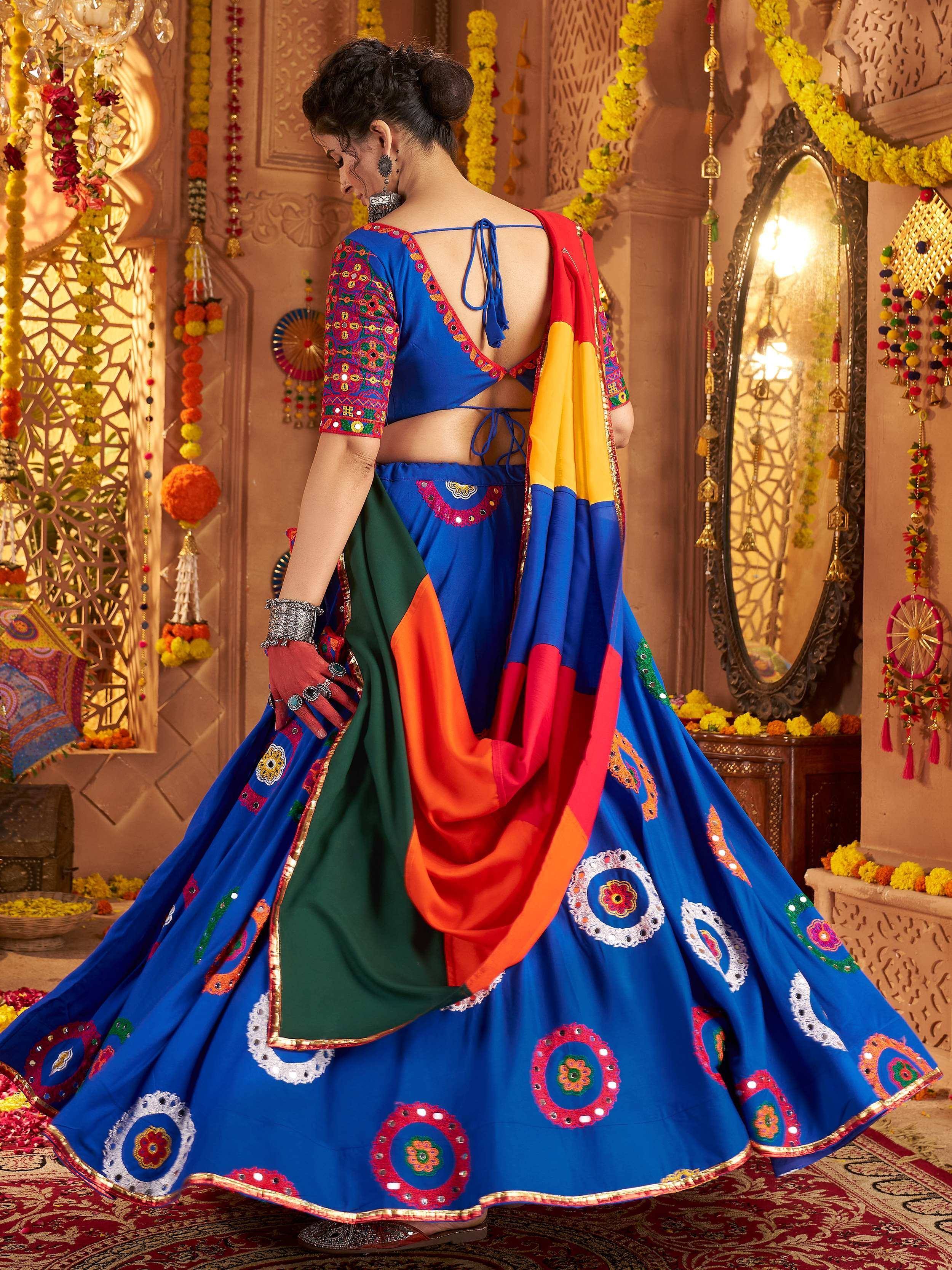 Blue embroidered lehenga choli with colorful dupatta, traditional Indian ethnic wear for festive occasions