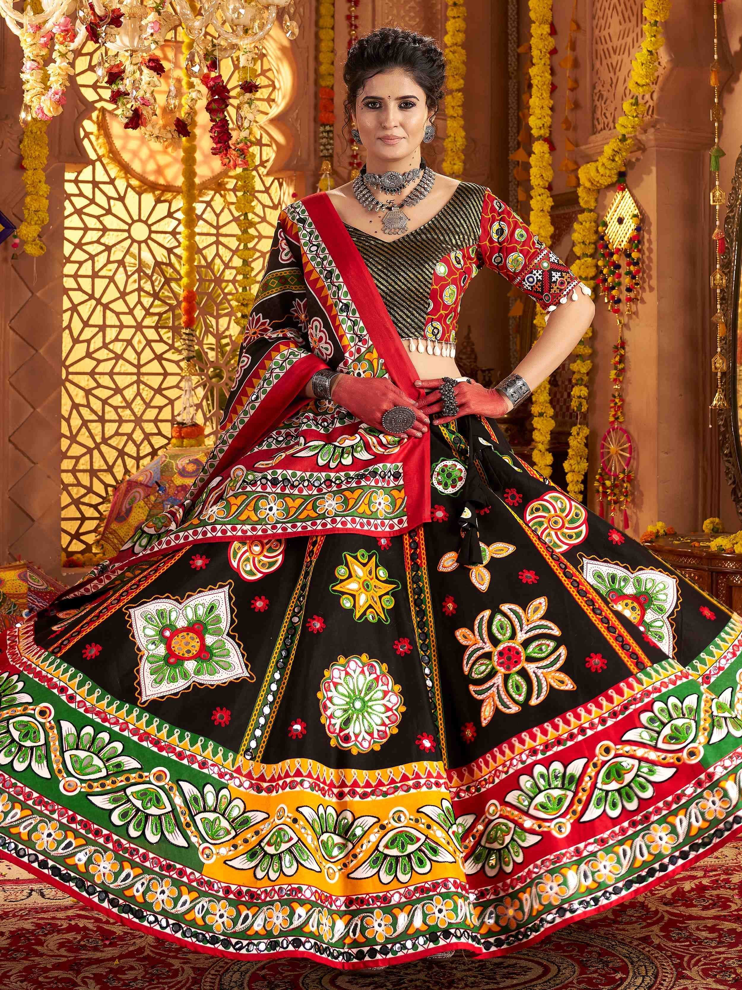 Black and red embroidered lehenga choli with mirror work, perfect for Indian ethnic wear and festive occasions.