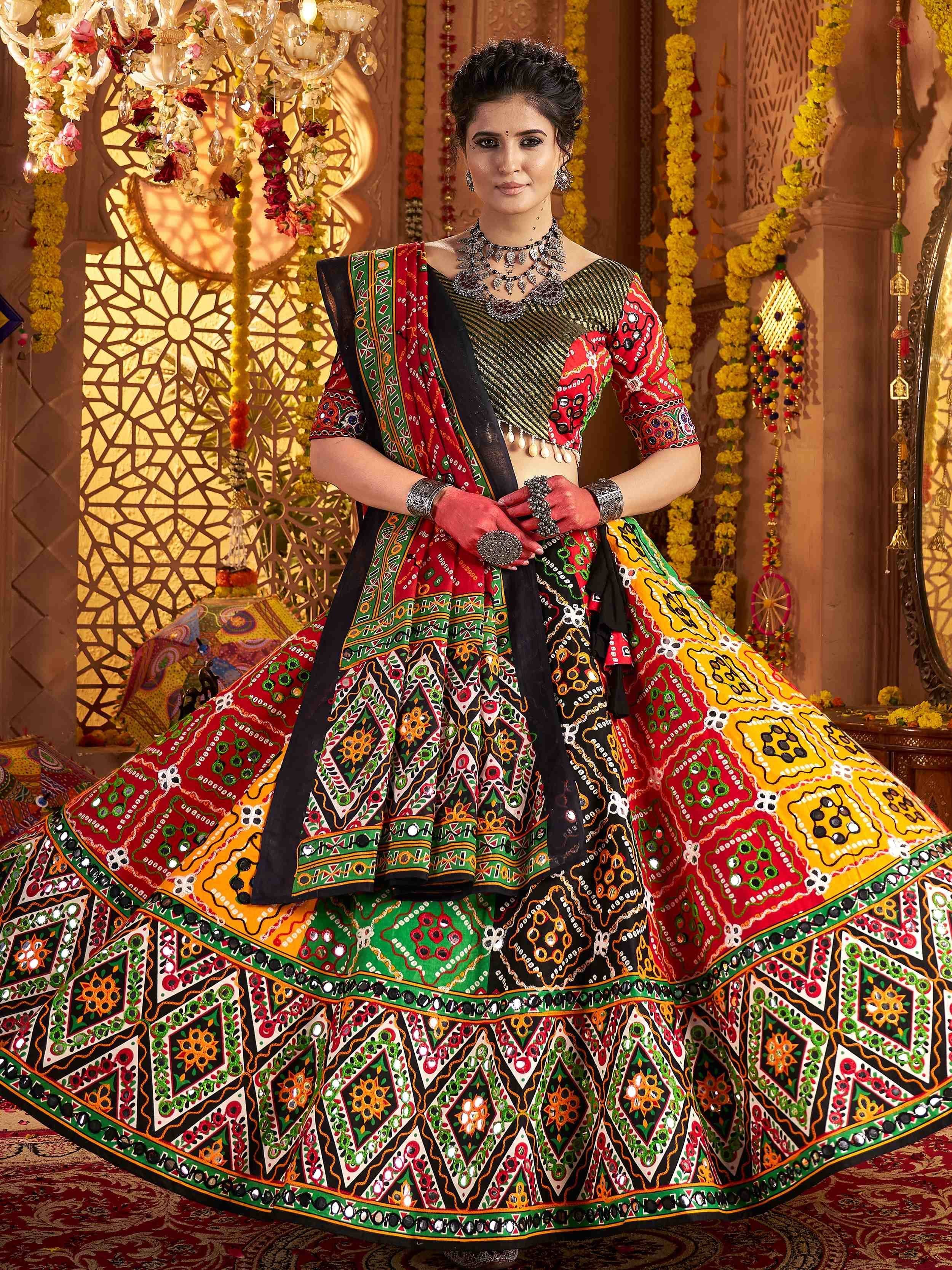 Vibrant ethnic lehenga choli with mirror work and bold patterns for festive occasions