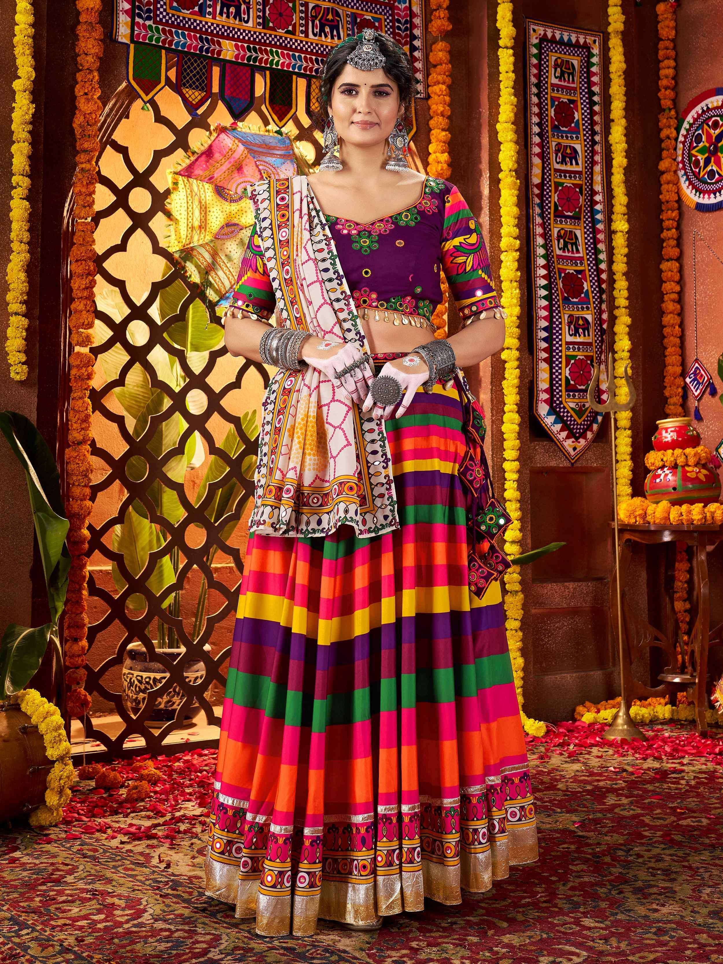 Vibrant Indian ethnic lehenga choli with colorful stripes, mirror work, and traditional jewelry for festive occasions