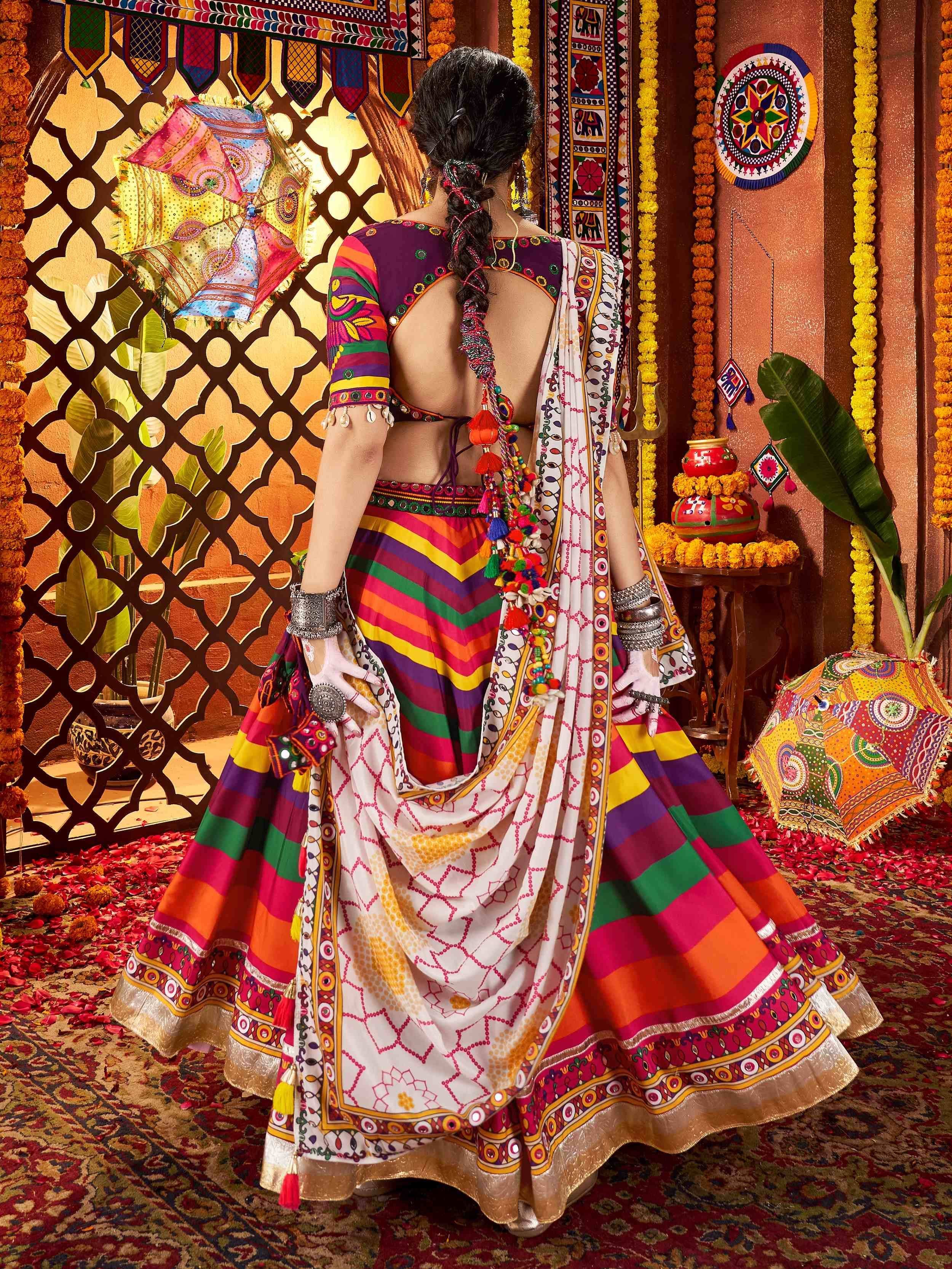 Vibrant Indian ethnic lehenga choli with colorful stripes, mirror work, and traditional dupatta, perfect for festive occasions.