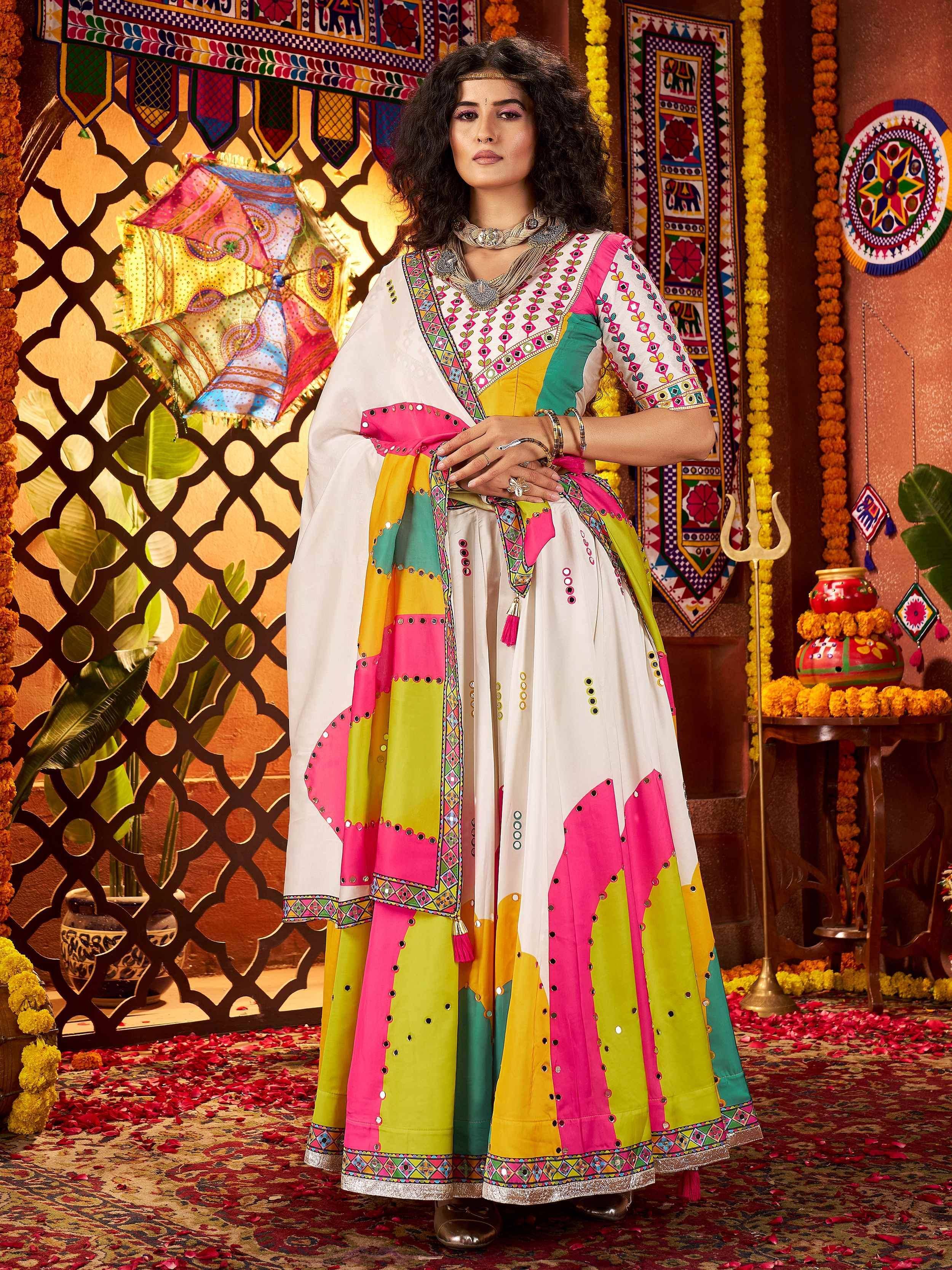 Vibrant Indian ethnic wear with colorful patchwork and mirror work, perfect for festive occasions.