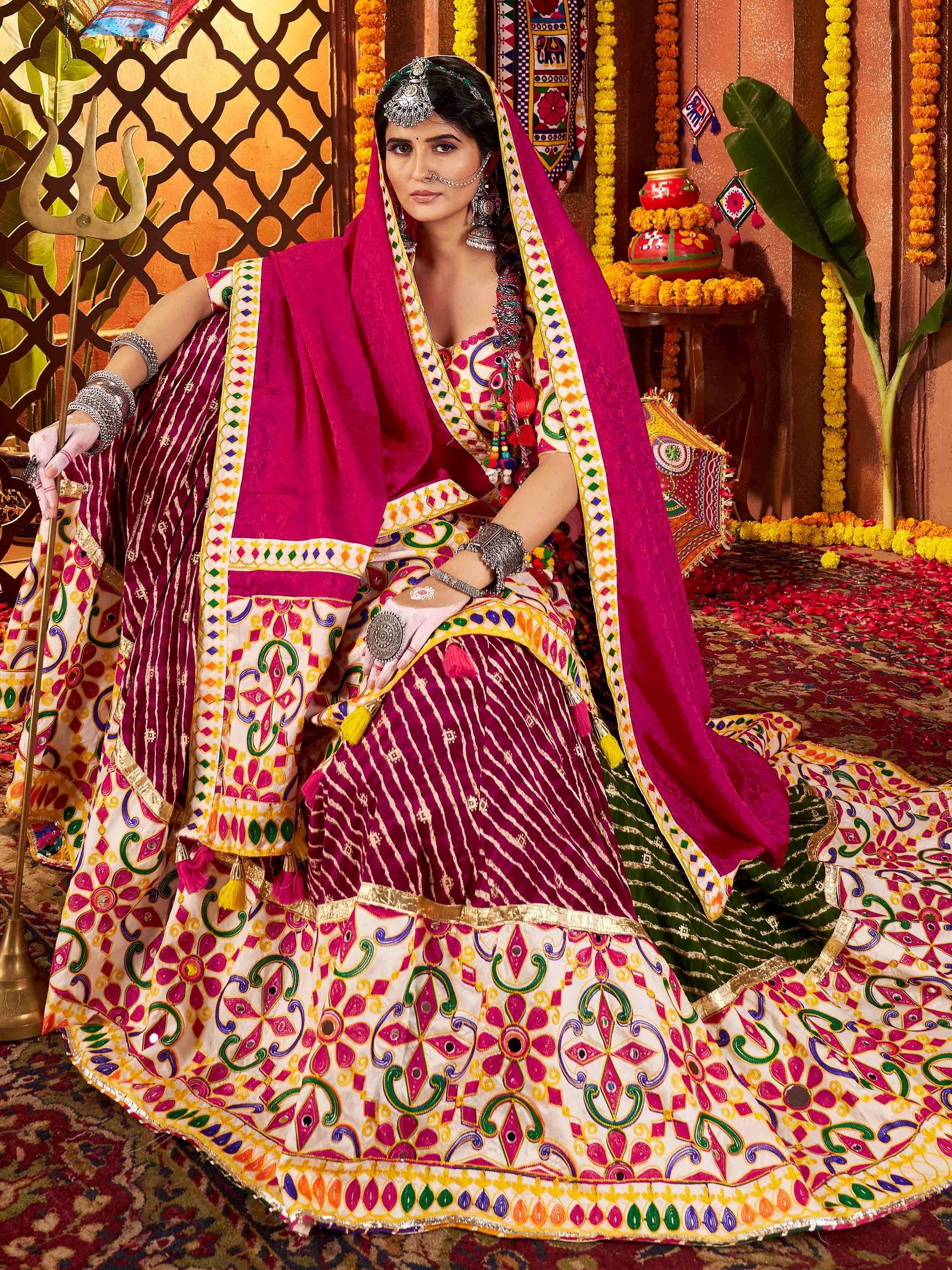 Woman in vibrant Indian ethnic wear, colorful embroidered lehenga choli with dupatta, traditional jewelry