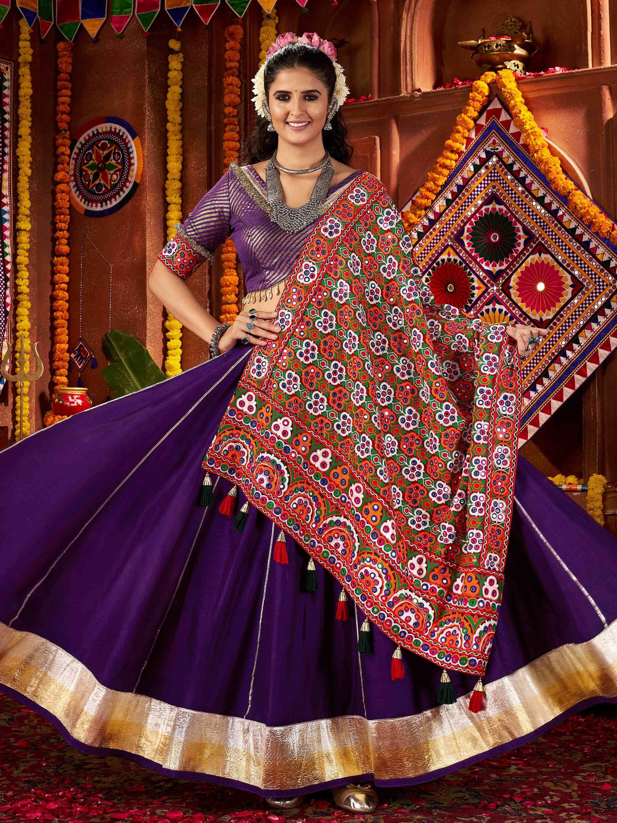 Purple lehenga choli with colorful mirror work dupatta, festive Indian ethnic wear