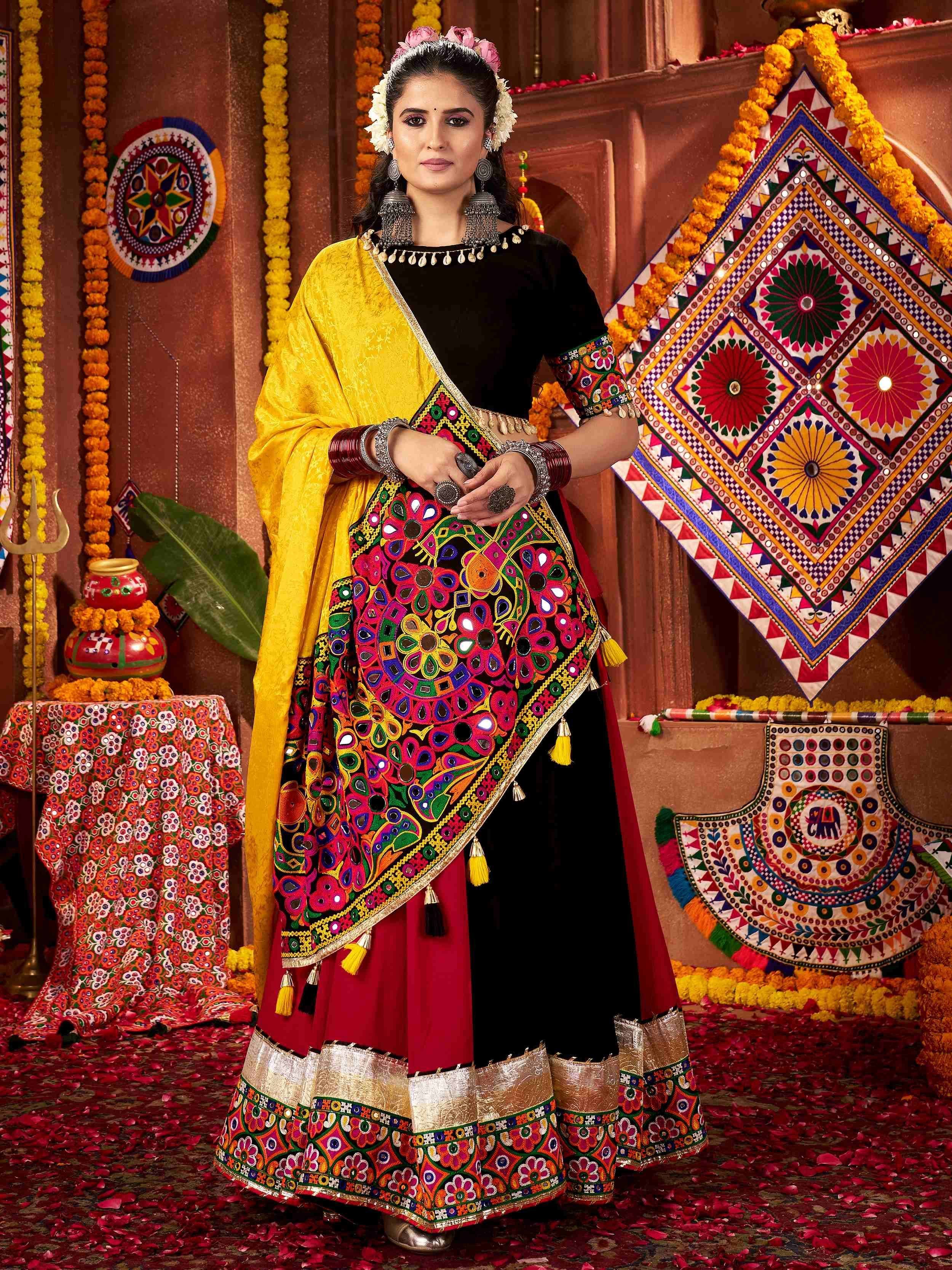 Vibrant Indian ethnic wear with mirror work, floral embroidery, and bold colors for festive occasions.