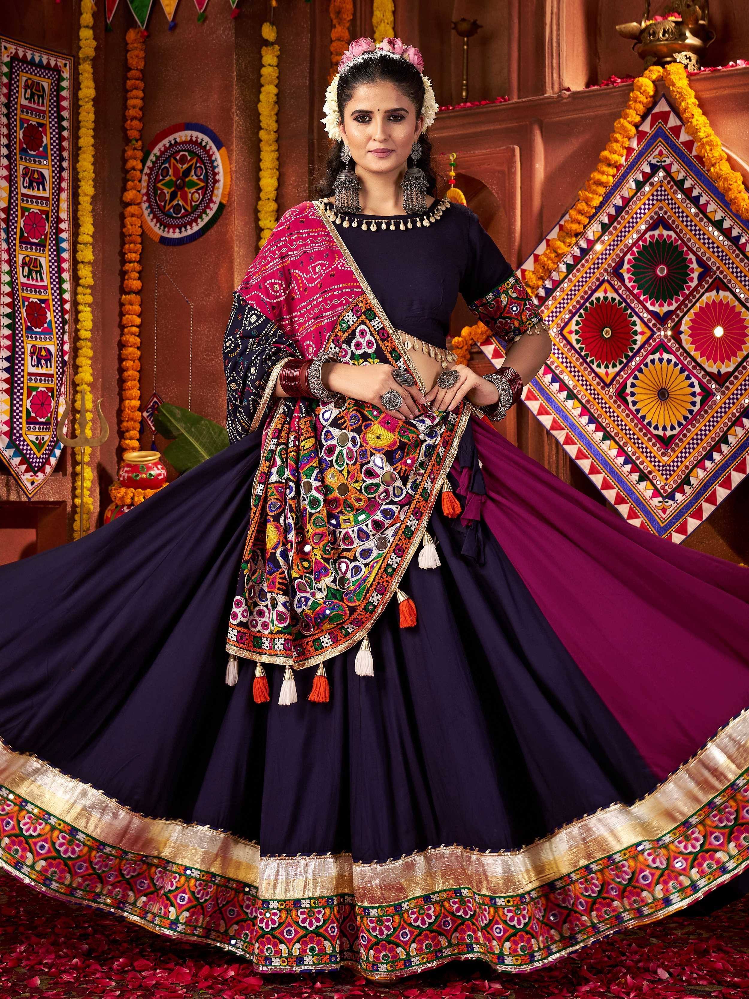 Elegant Indian ethnic wear with vibrant embroidery and colorful dupatta, perfect for festive occasions.