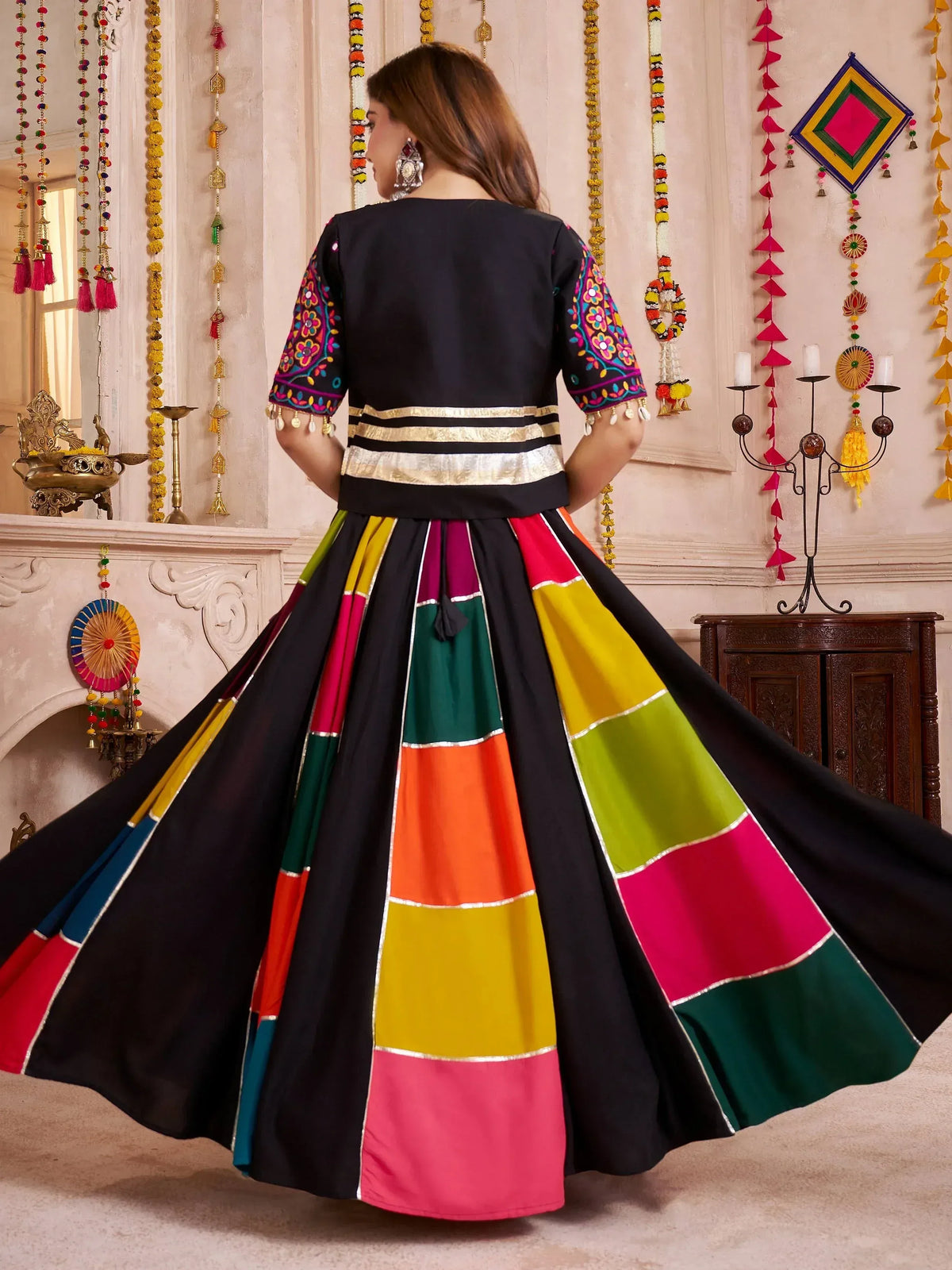 Black embroidered top with colorful patchwork lehenga, Indian ethnic wear for festive occasions