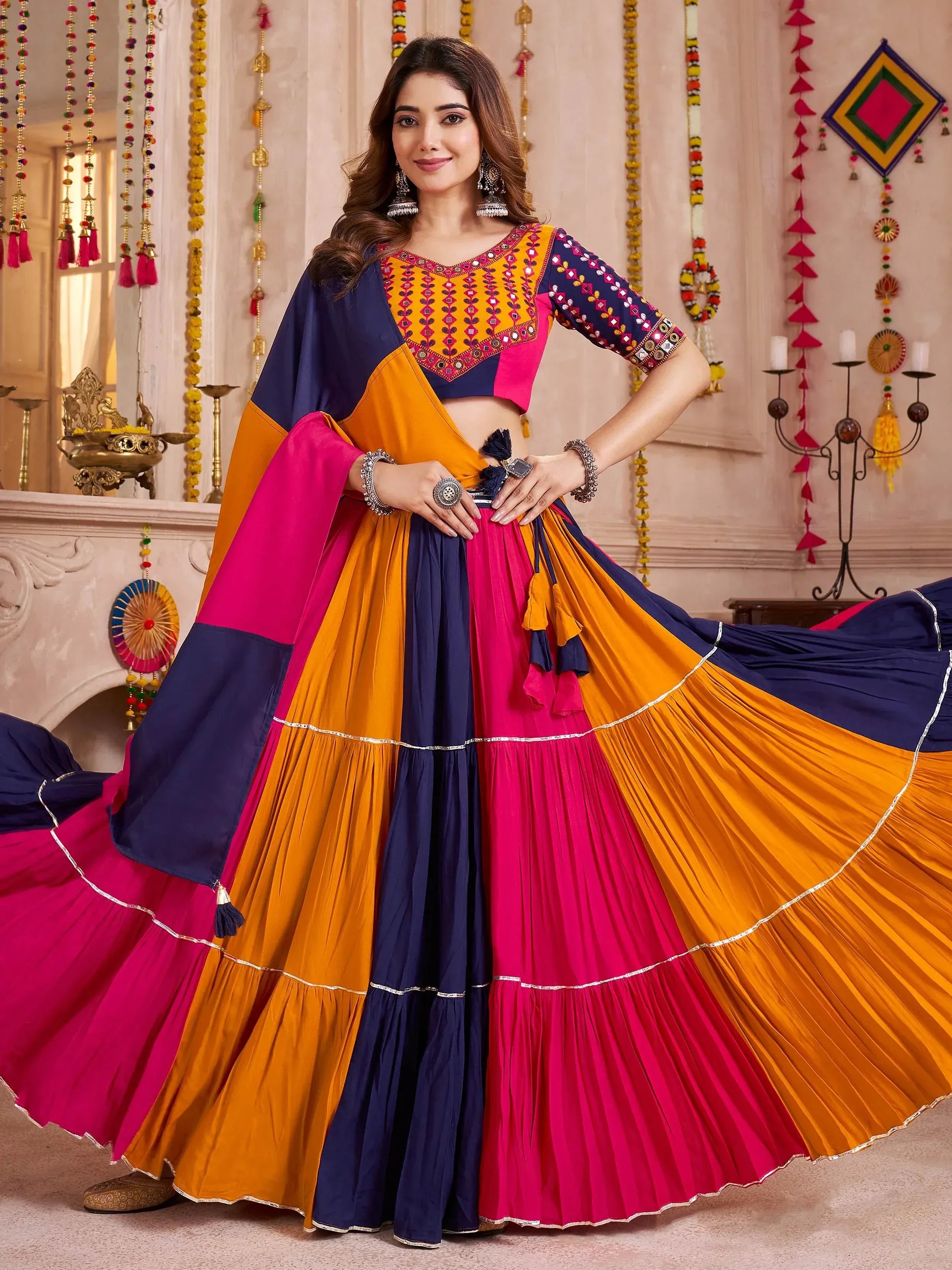 Vibrant multicolor lehenga choli with mirror work, perfect for Indian ethnic wear and festive occasions.