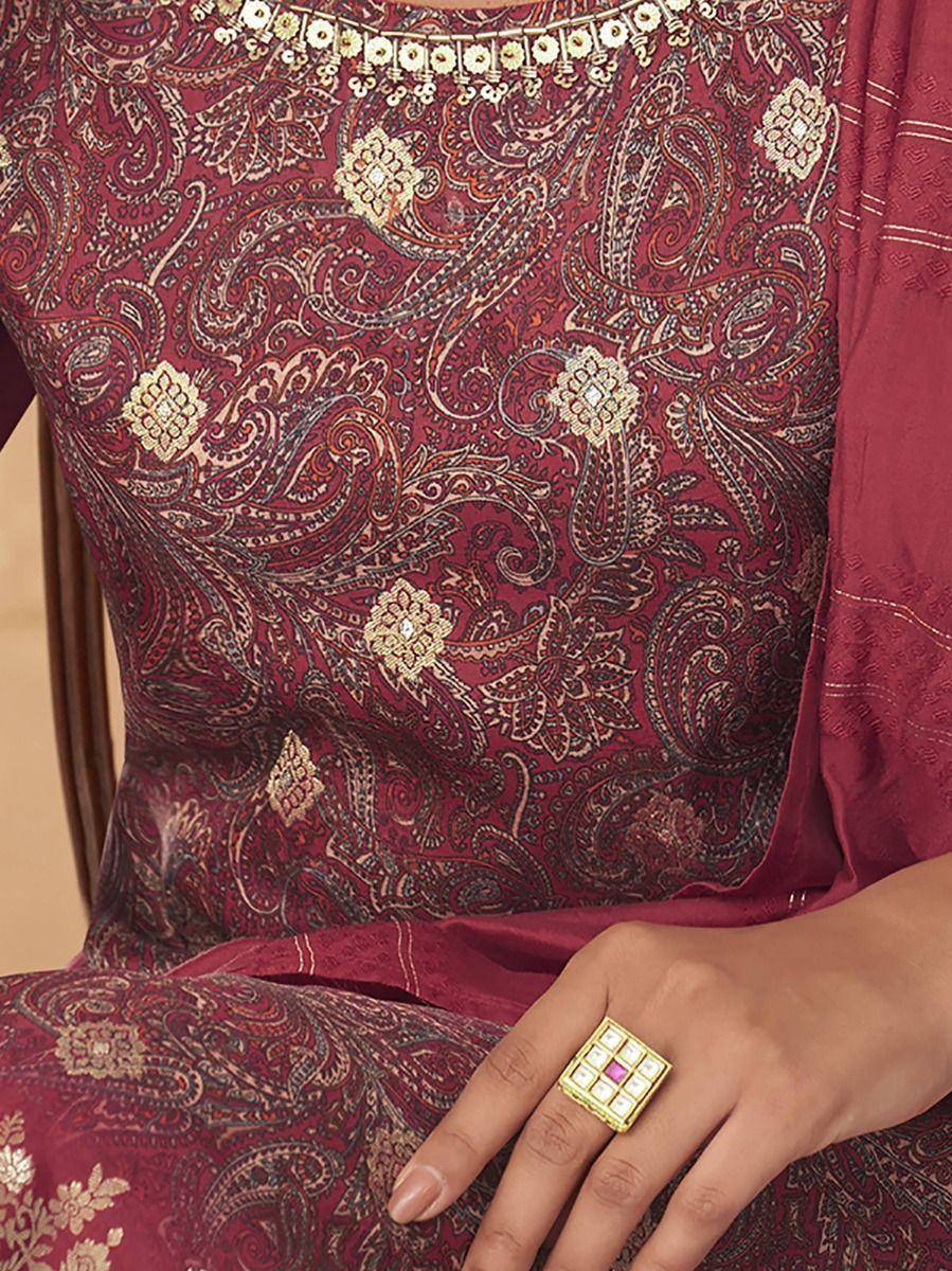Maroon ethnic salwar kameez with gold paisley embroidery and stone work, paired with matching dupatta