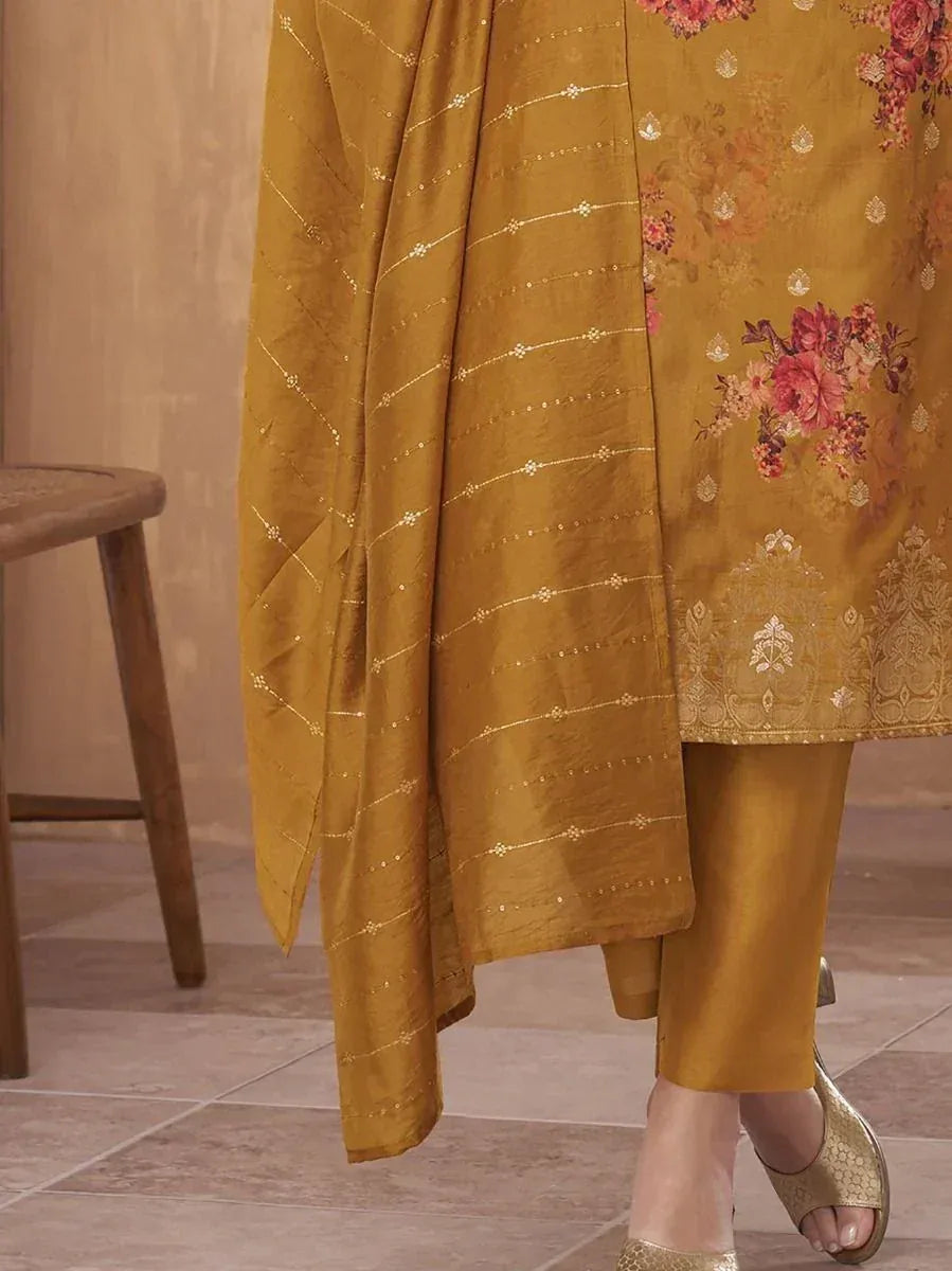 Mustard yellow floral embroidered salwar kameez with golden dupatta and matching pants