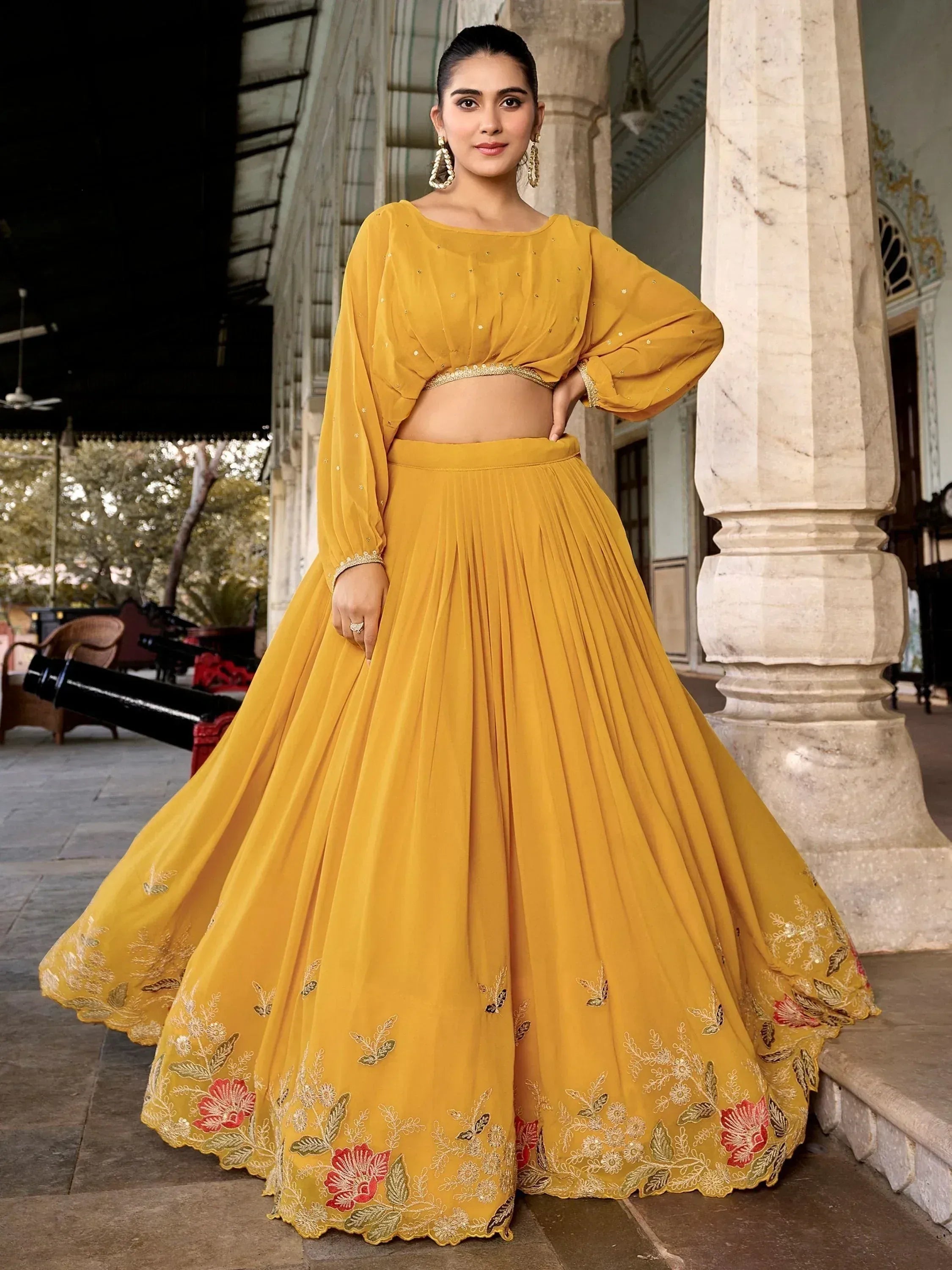 Mustard yellow designer lehenga choli with floral embroidery, perfect for Indian ethnic wear events