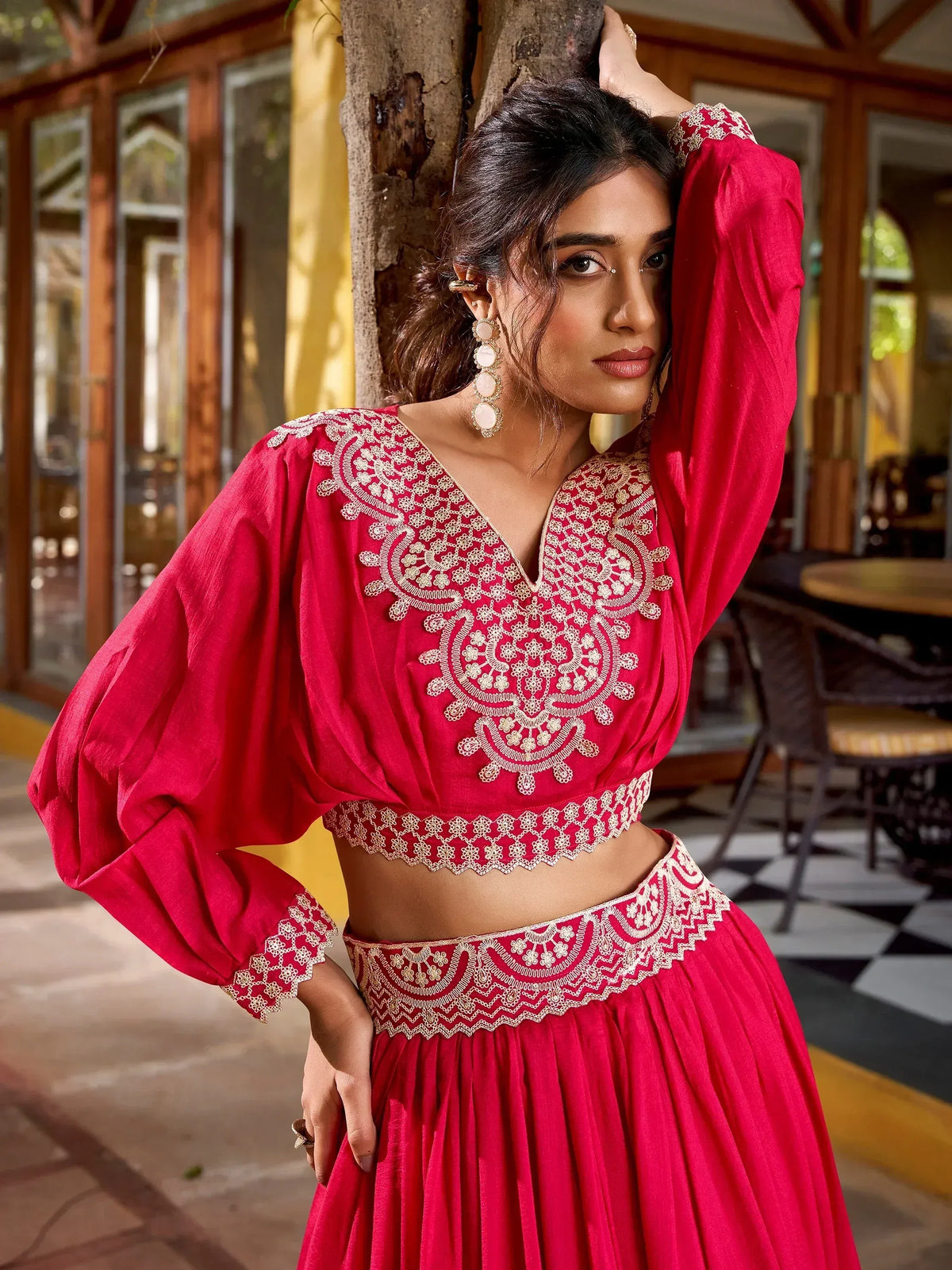 Red embroidered lehenga choli with gold detailing, perfect for Indian ethnic wear occasions