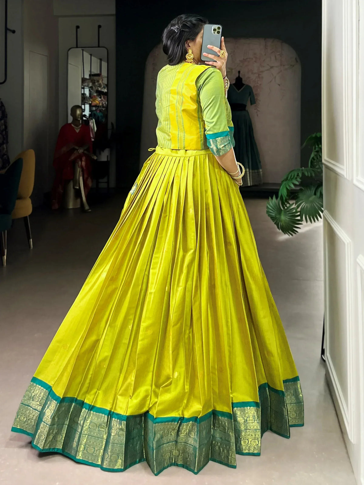 Vibrant yellow lehenga with green border, perfect for Indian ethnic wear occasions