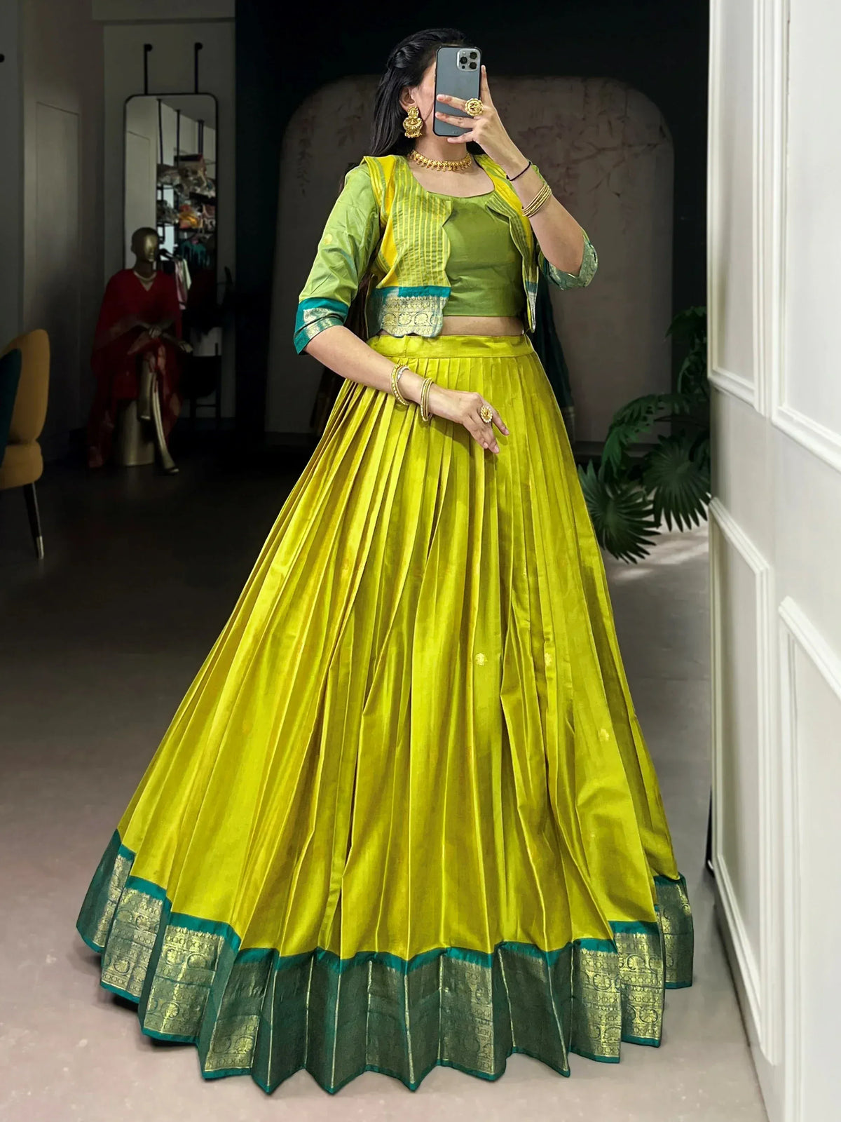 Vibrant yellow-green lehenga choli with gold embroidery, perfect for Indian ethnic wear events.