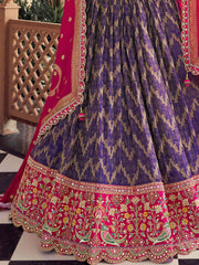 Fabulous Purple Zari Weaving Tissue Wedding Wear Lehenga Choli