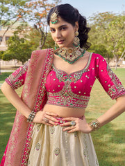 Outstanding Off-White Beads Work Tissue Bridesmaid Lehenga Choli 