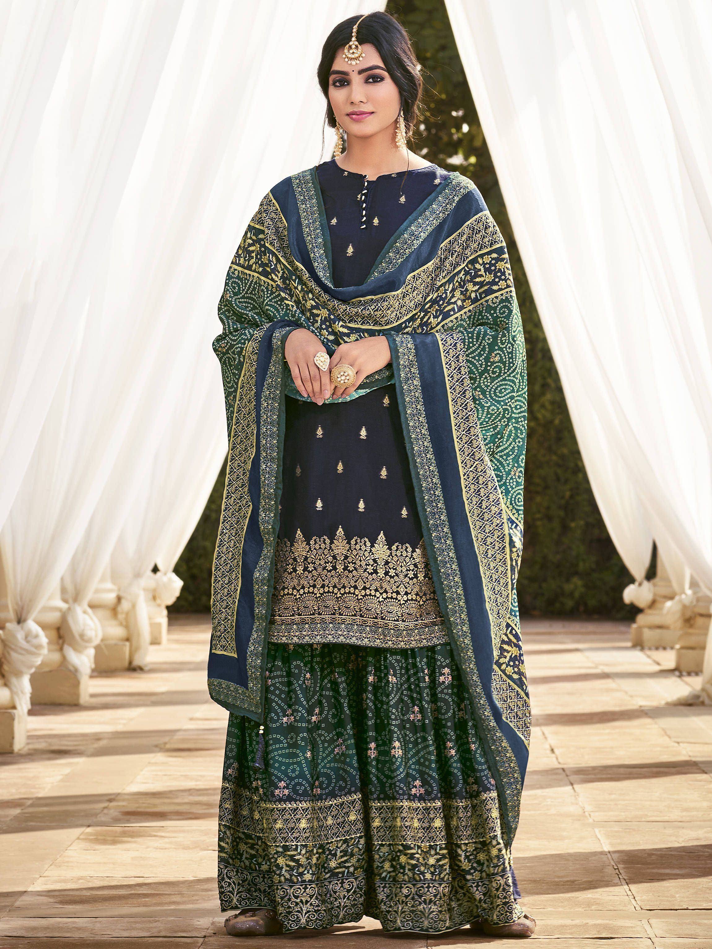 Elegant navy and green ethnic salwar kameez with gold embroidery, perfect for festive occasions