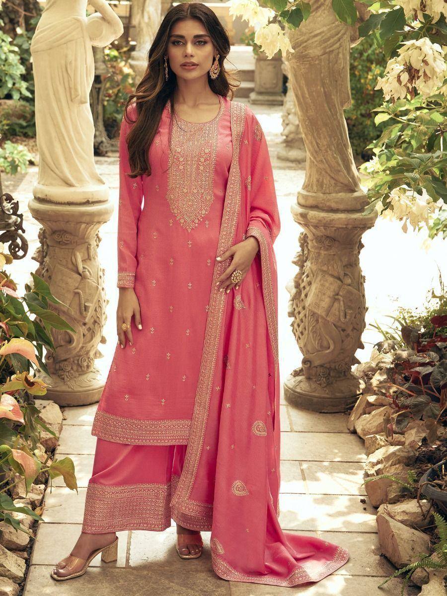 Pink embroidered salwar kameez with gold detailing, perfect for ethnic occasions and festive wear