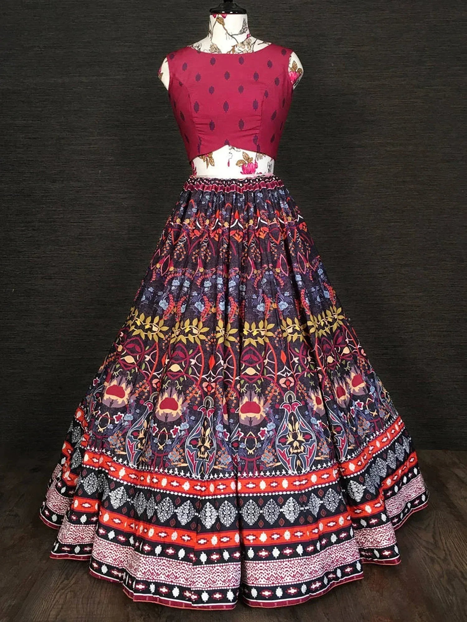 Ethnic printed lehenga choli with floral motifs and vibrant borders, perfect for Indian celebrations