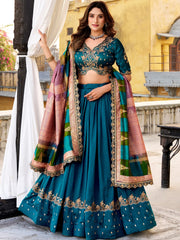 Dazzling Teal Blue Embroidered Silk Wedding Wear Lehenga Choli