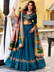 Dazzling Teal Blue Embroidered Silk Wedding Wear Lehenga Choli