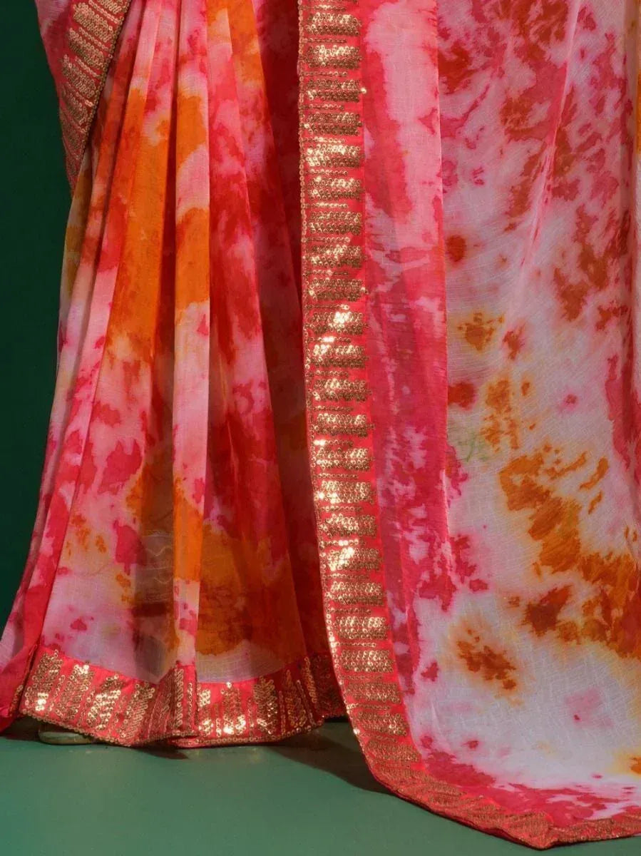 Pink and orange tie-dye saree with gold sequin border, ethnic Indian wear